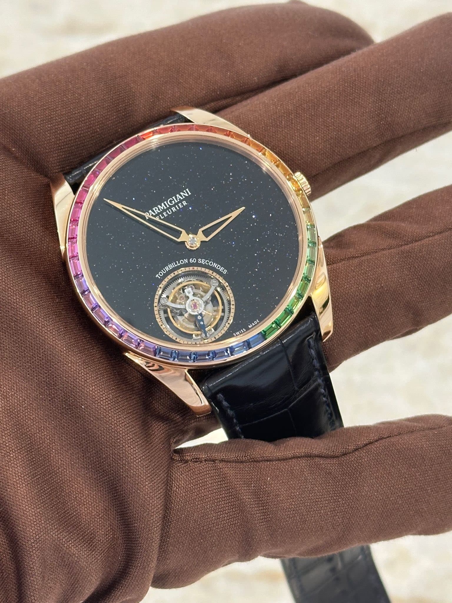 May be an image of wrist watch and text that says 'ARMIGIANI ARMIGIANI RIE EL URI LEURIER TOURBILLON 60 ERREKO SECONDES SWISS SM MADE'