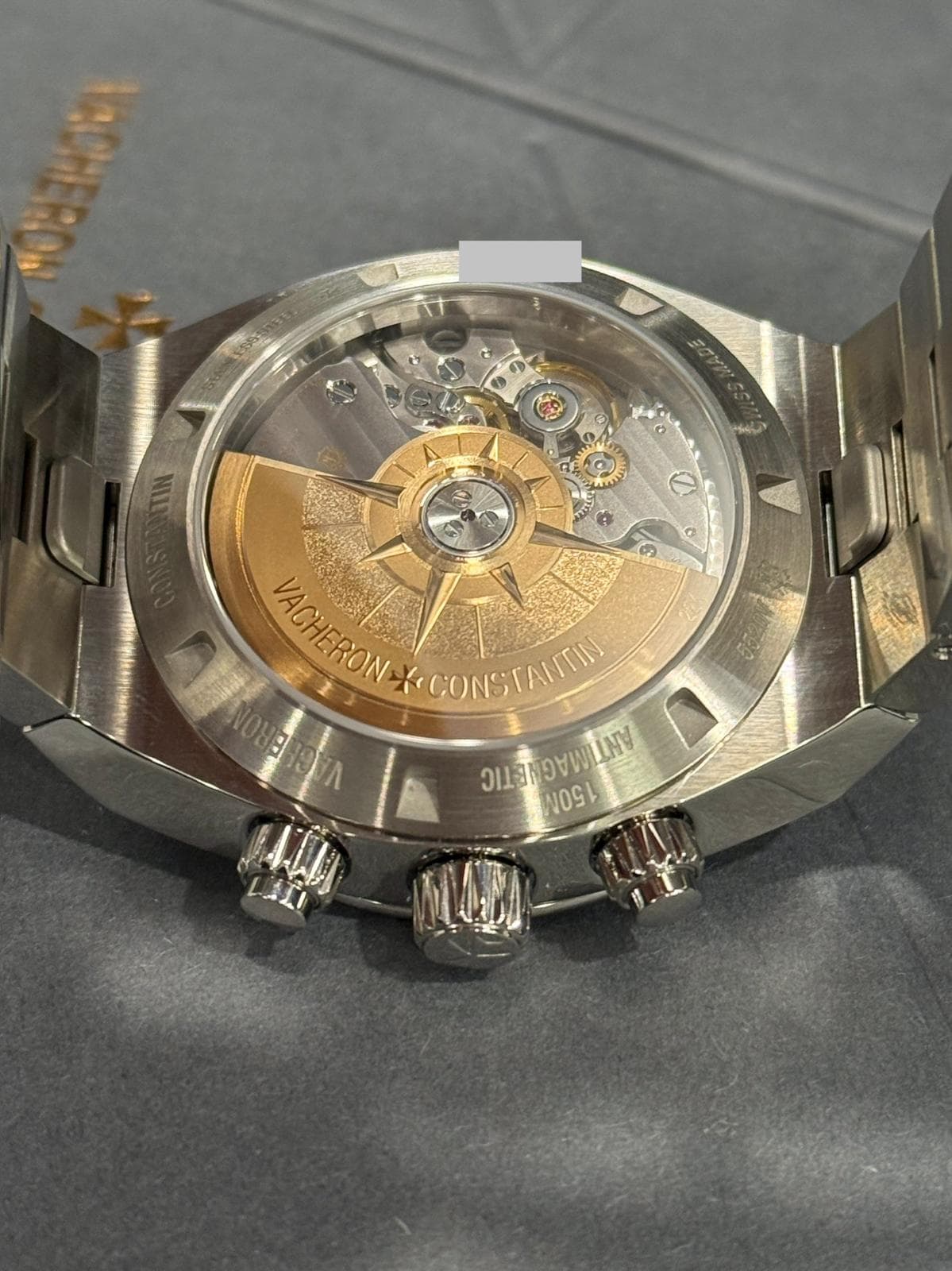 May be an image of wrist watch and text