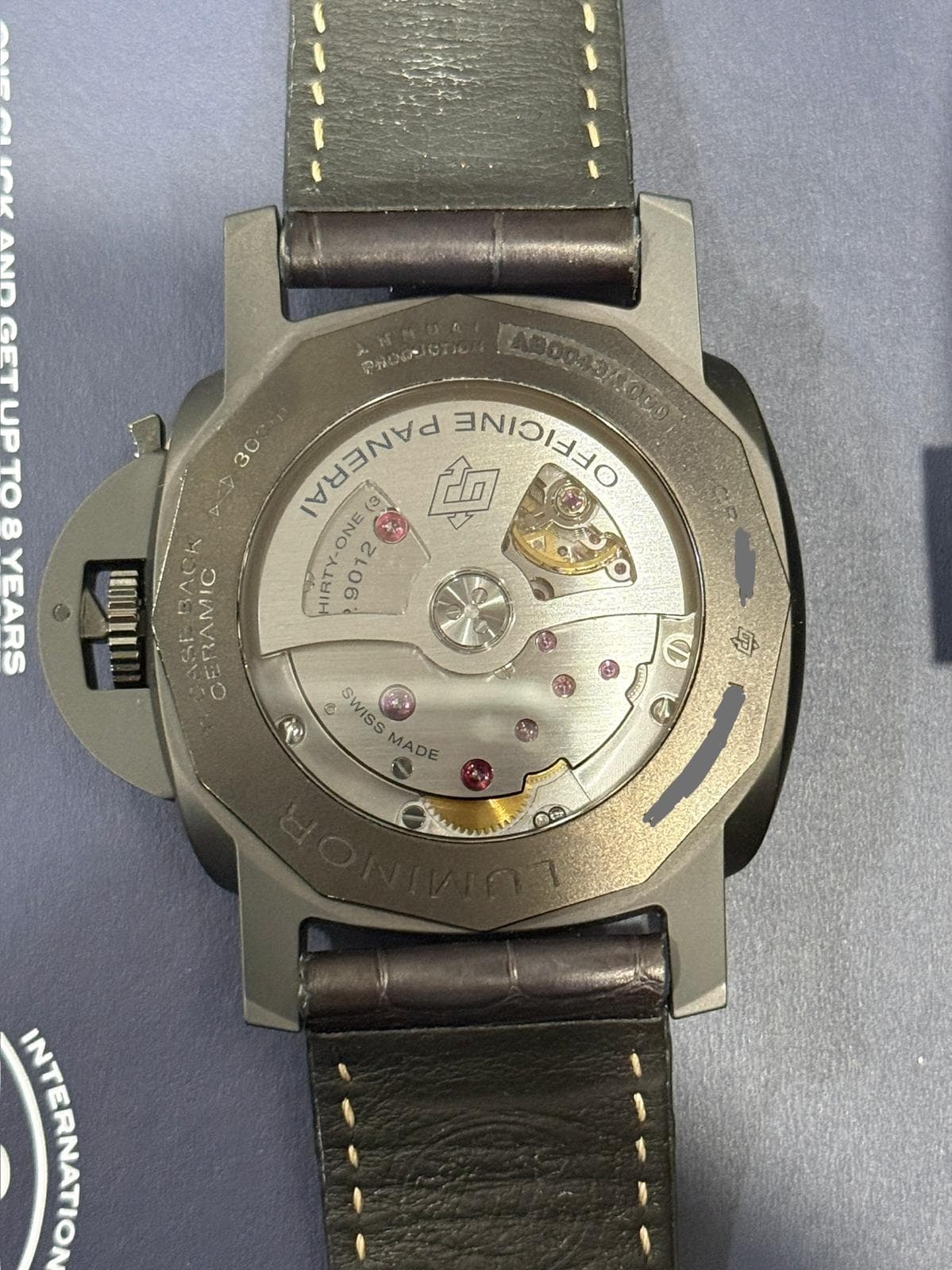 May be an image of wrist watch and text