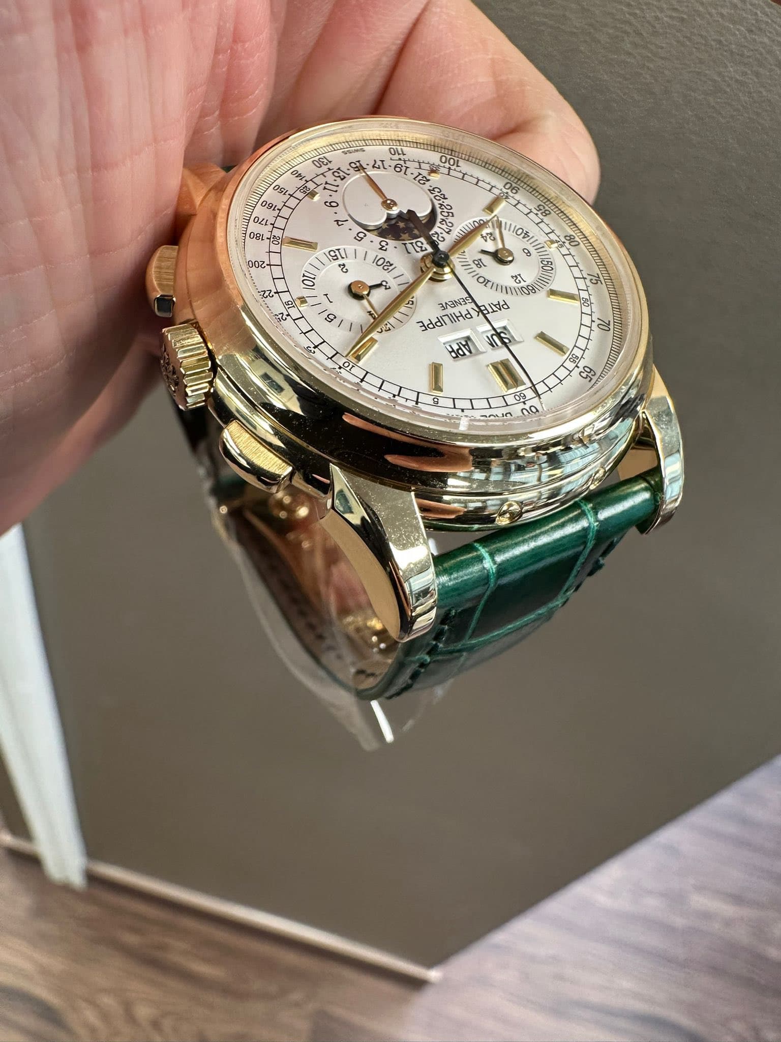 May be an image of wrist watch and text