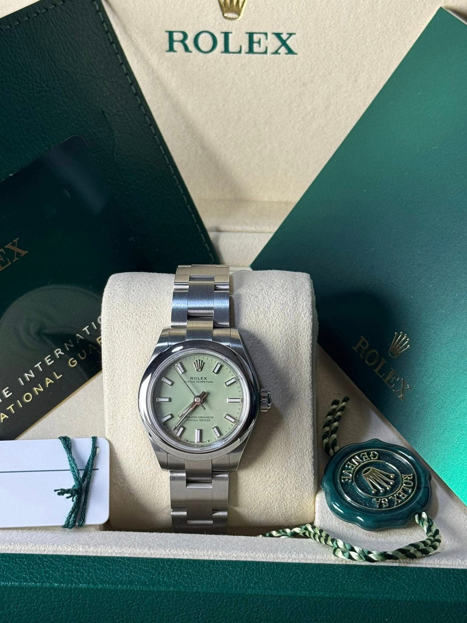 May be an image of wrist watch and text