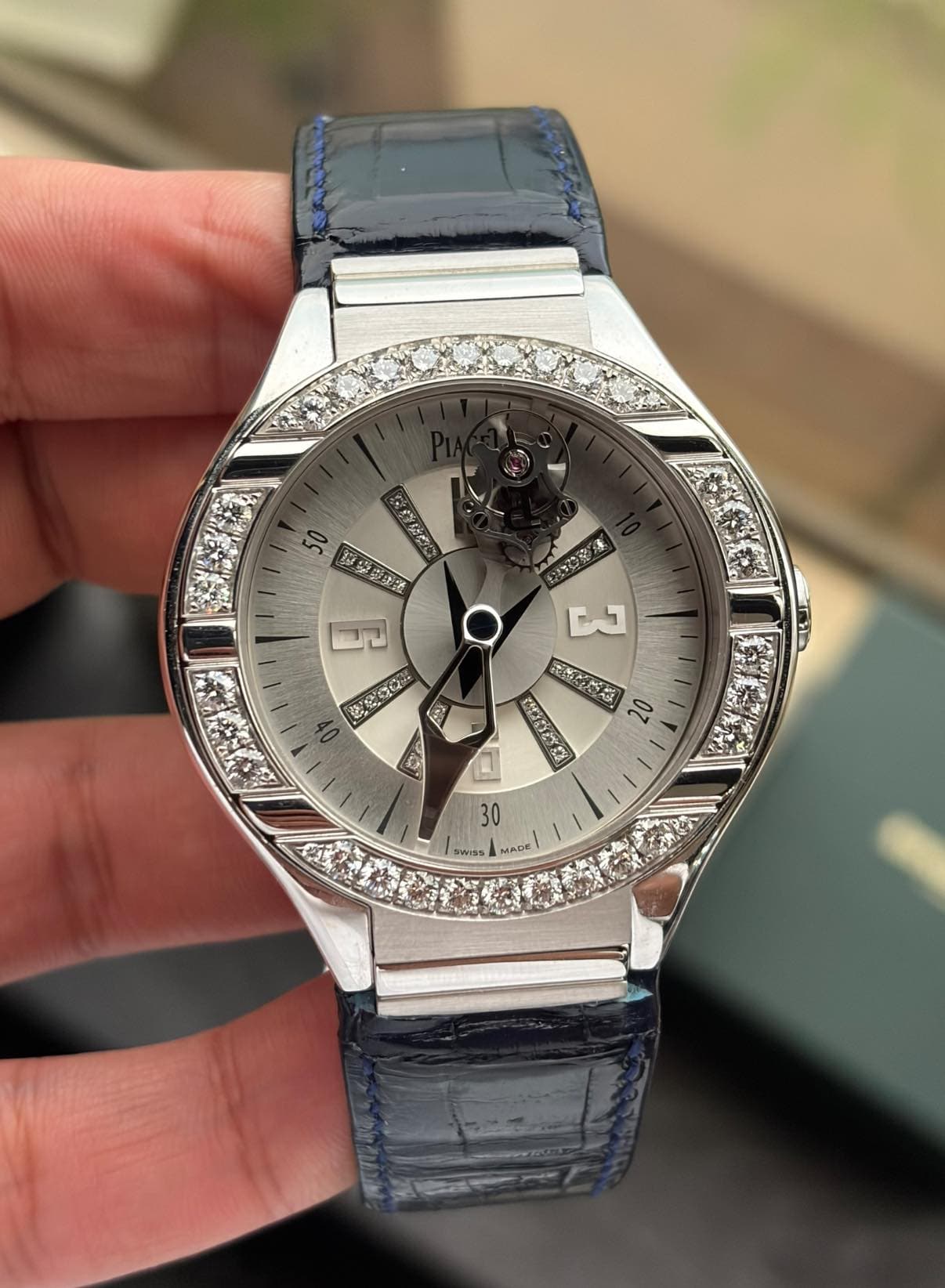May be an image of wrist watch and text