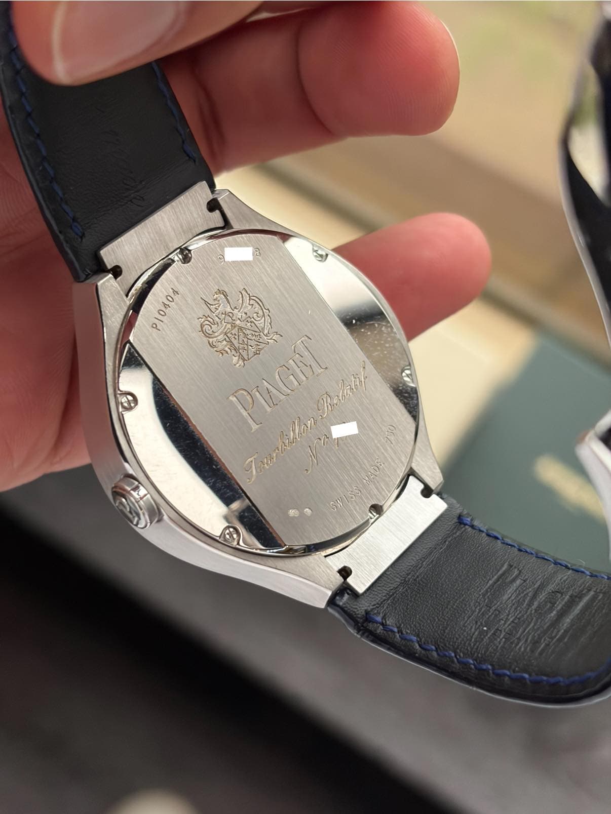 May be an image of wrist watch and text