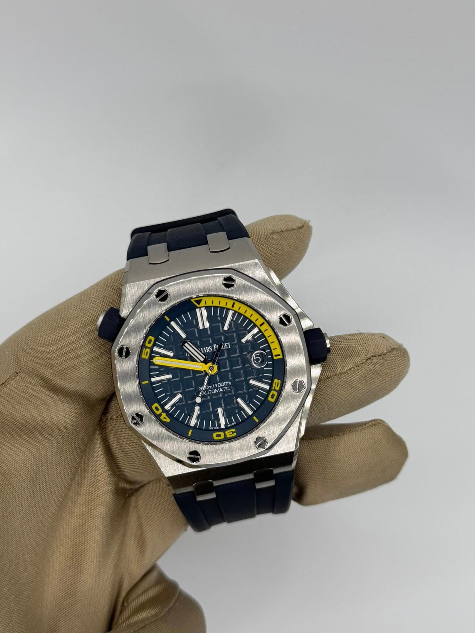 May be an image of wrist watch and text