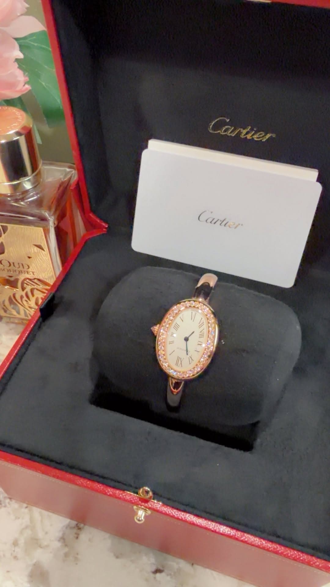 May be an image of wrist watch and text