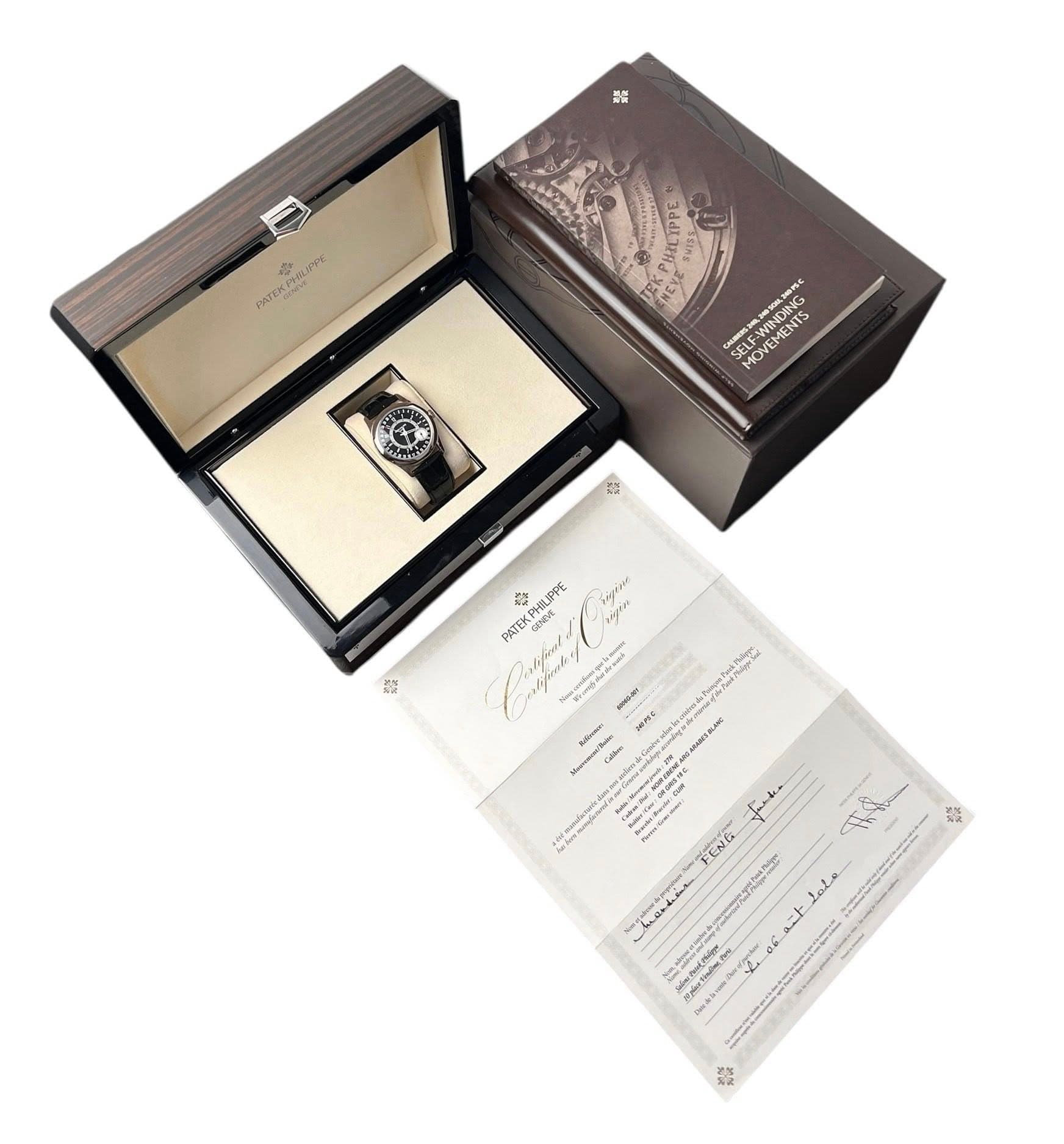 May be an image of wrist watch, fragrance, cufflinks and text