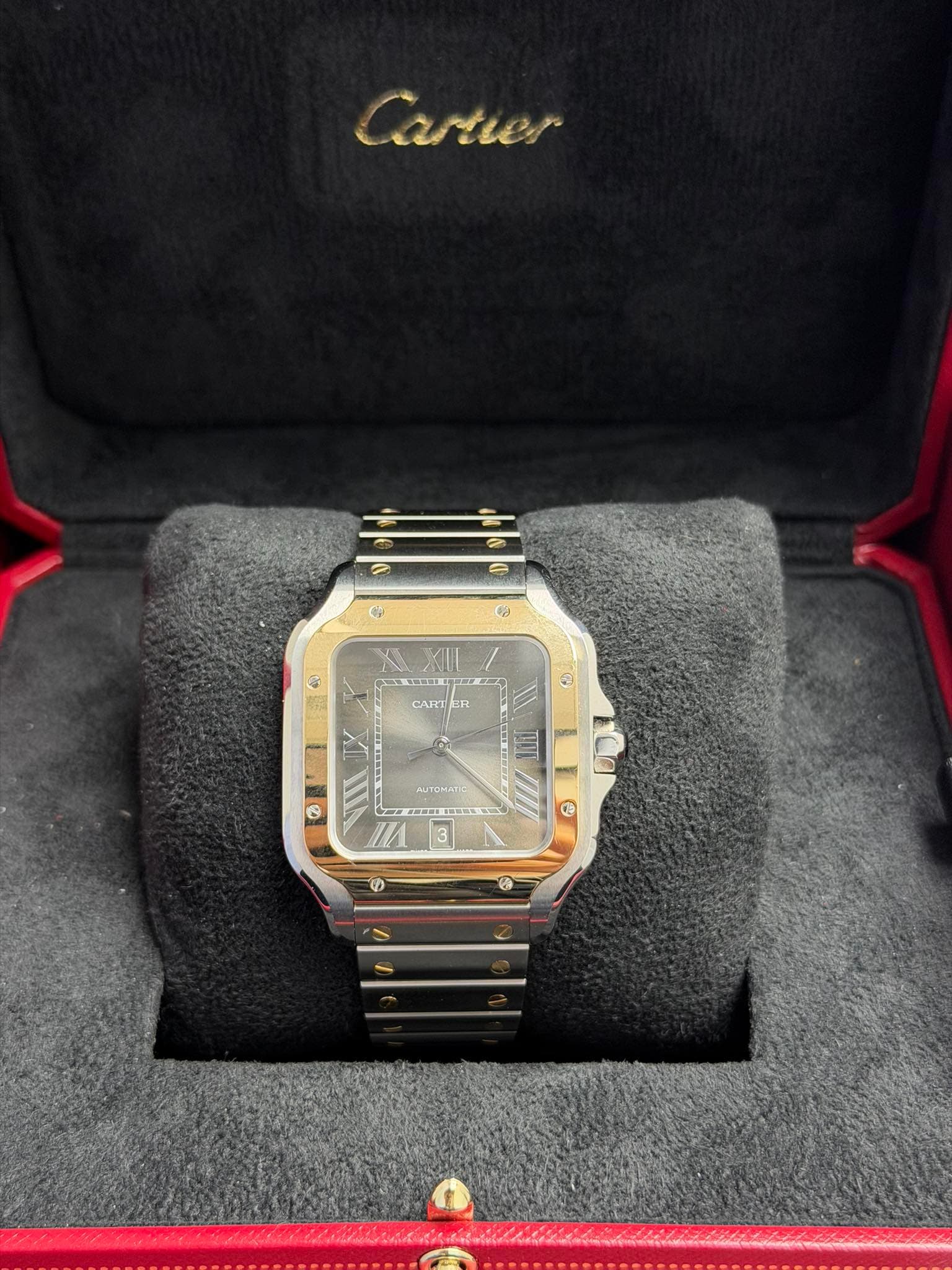 May be an image of wrist watch and text