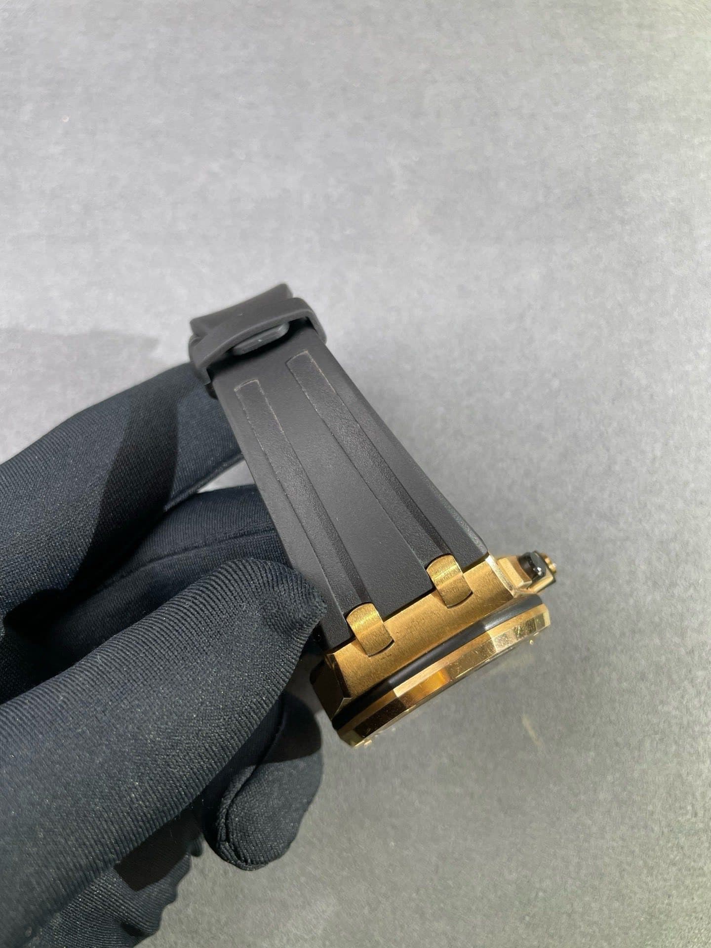 May be an image of wrist watch and brass