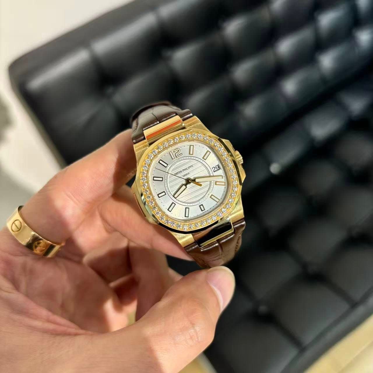 May be an image of wrist watch and text