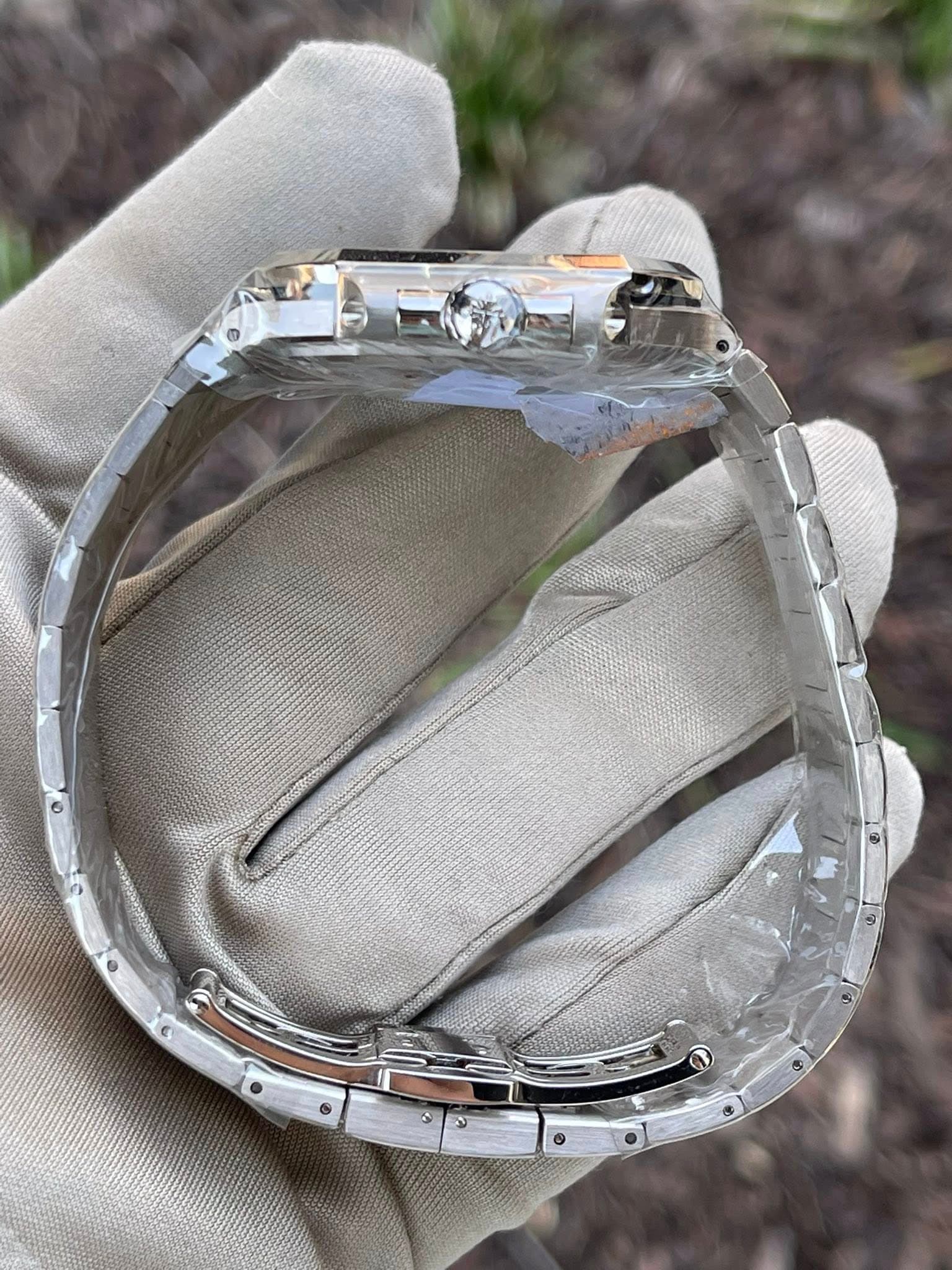 May be an image of wrist watch and ring