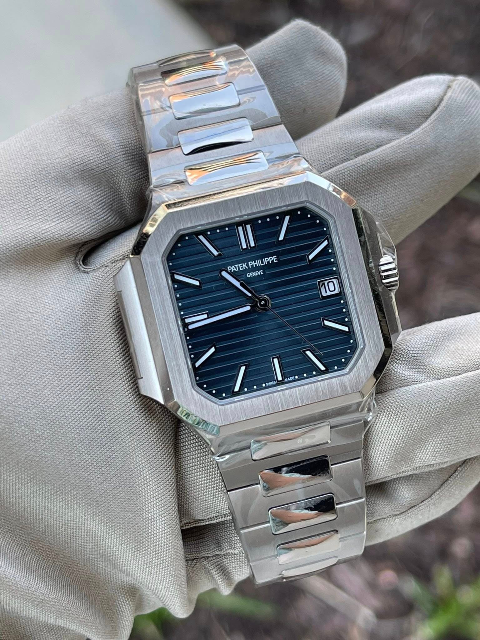 May be an image of wrist watch and text