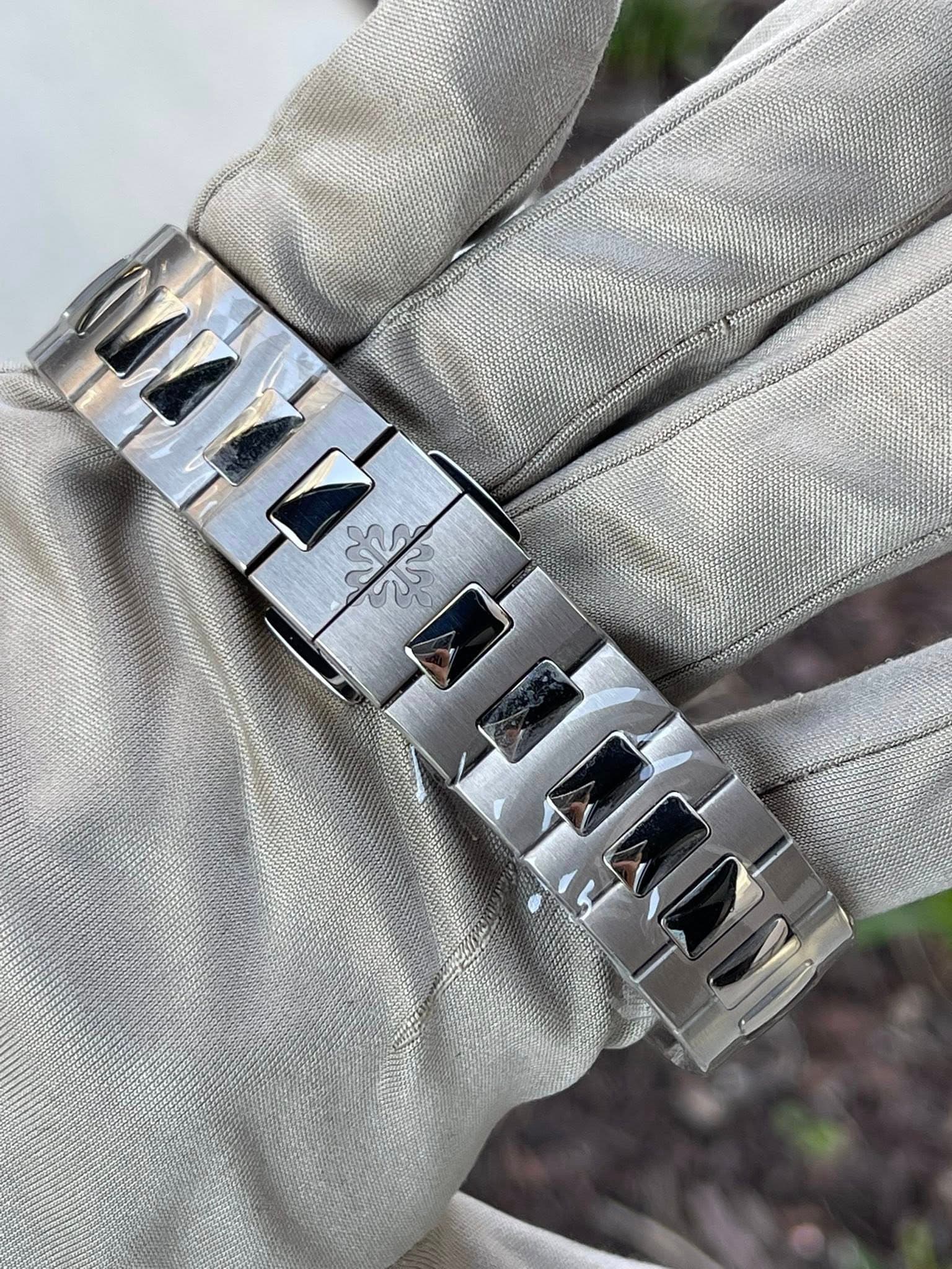 May be an image of wrist watch and text