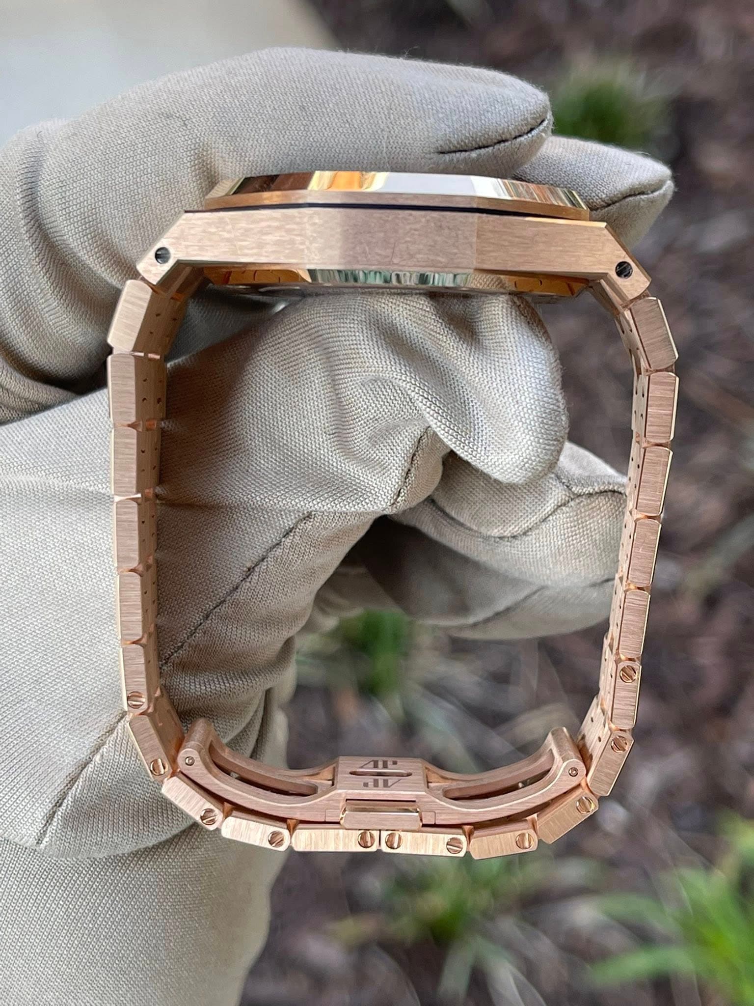 May be an image of wrist watch and text
