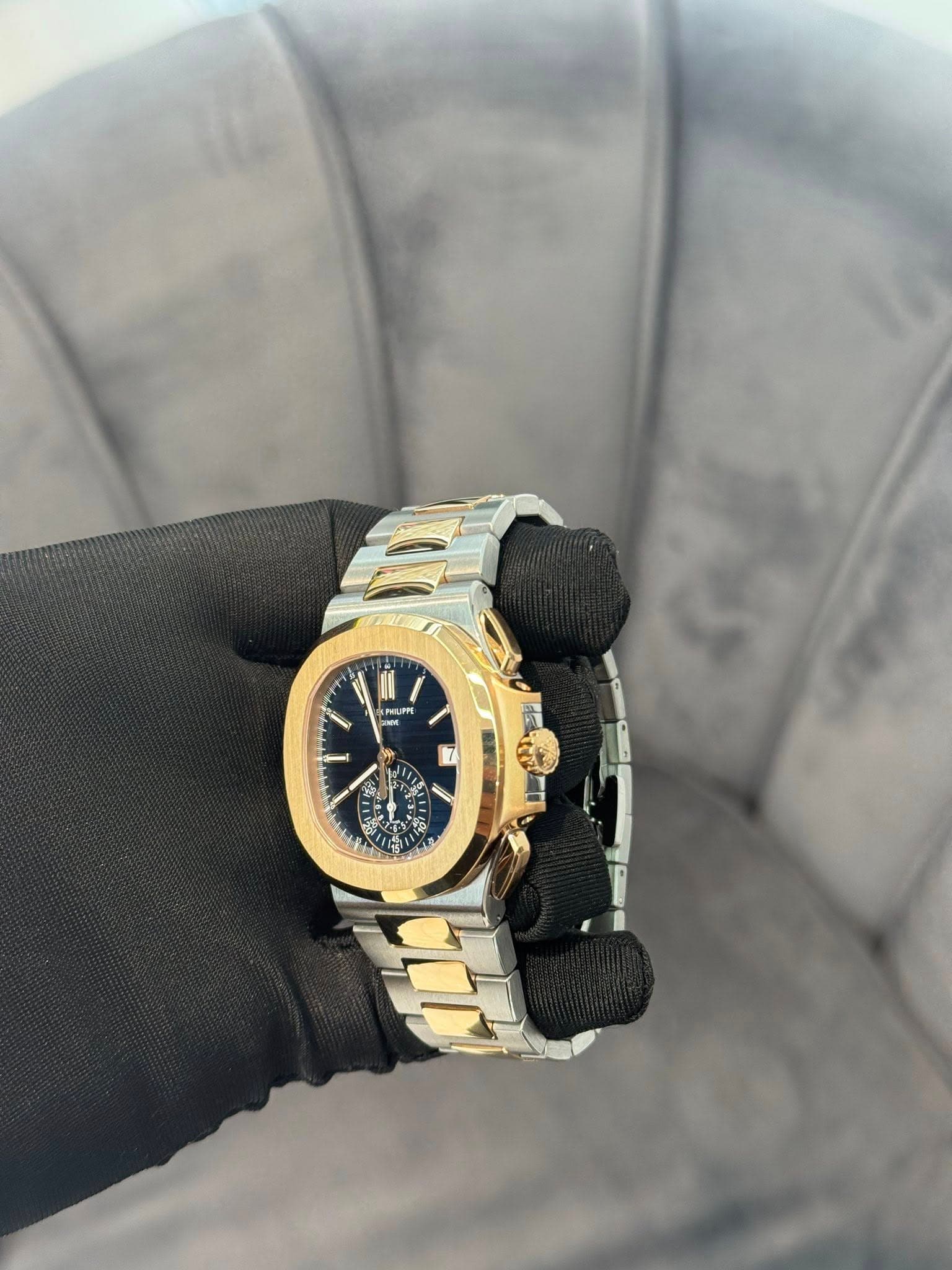 May be an image of wrist watch and text