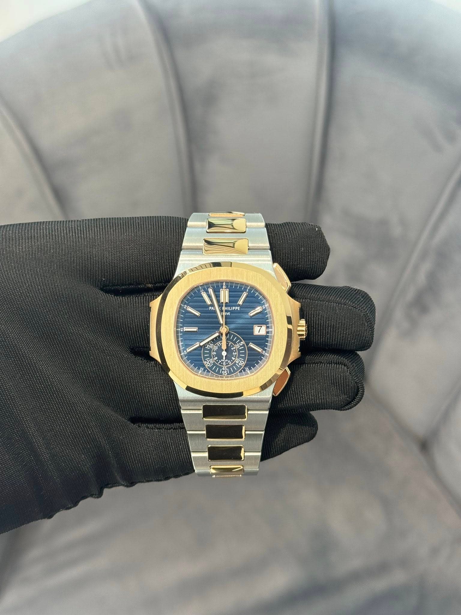 May be an image of wrist watch and text