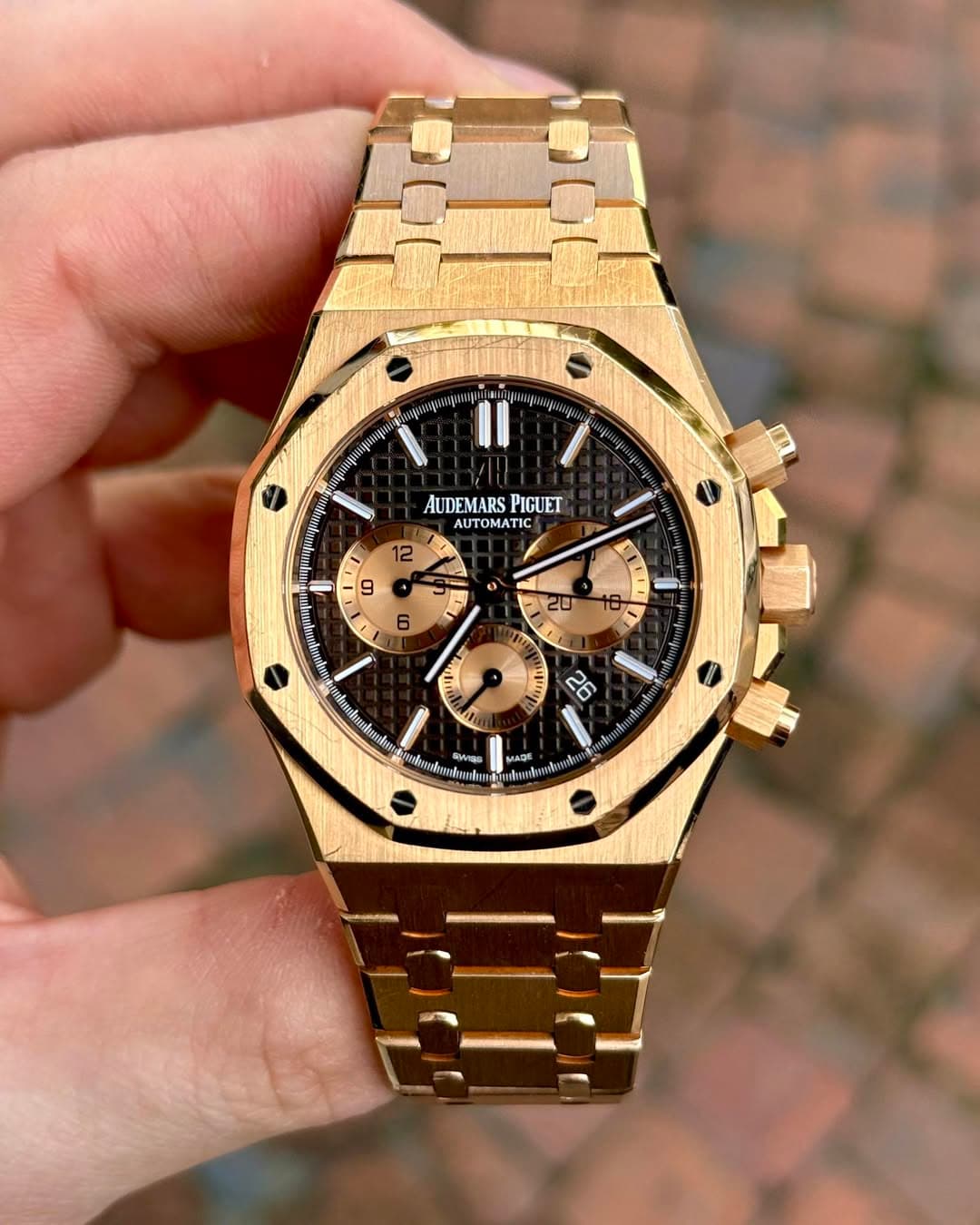 May be an image of wrist watch and text
