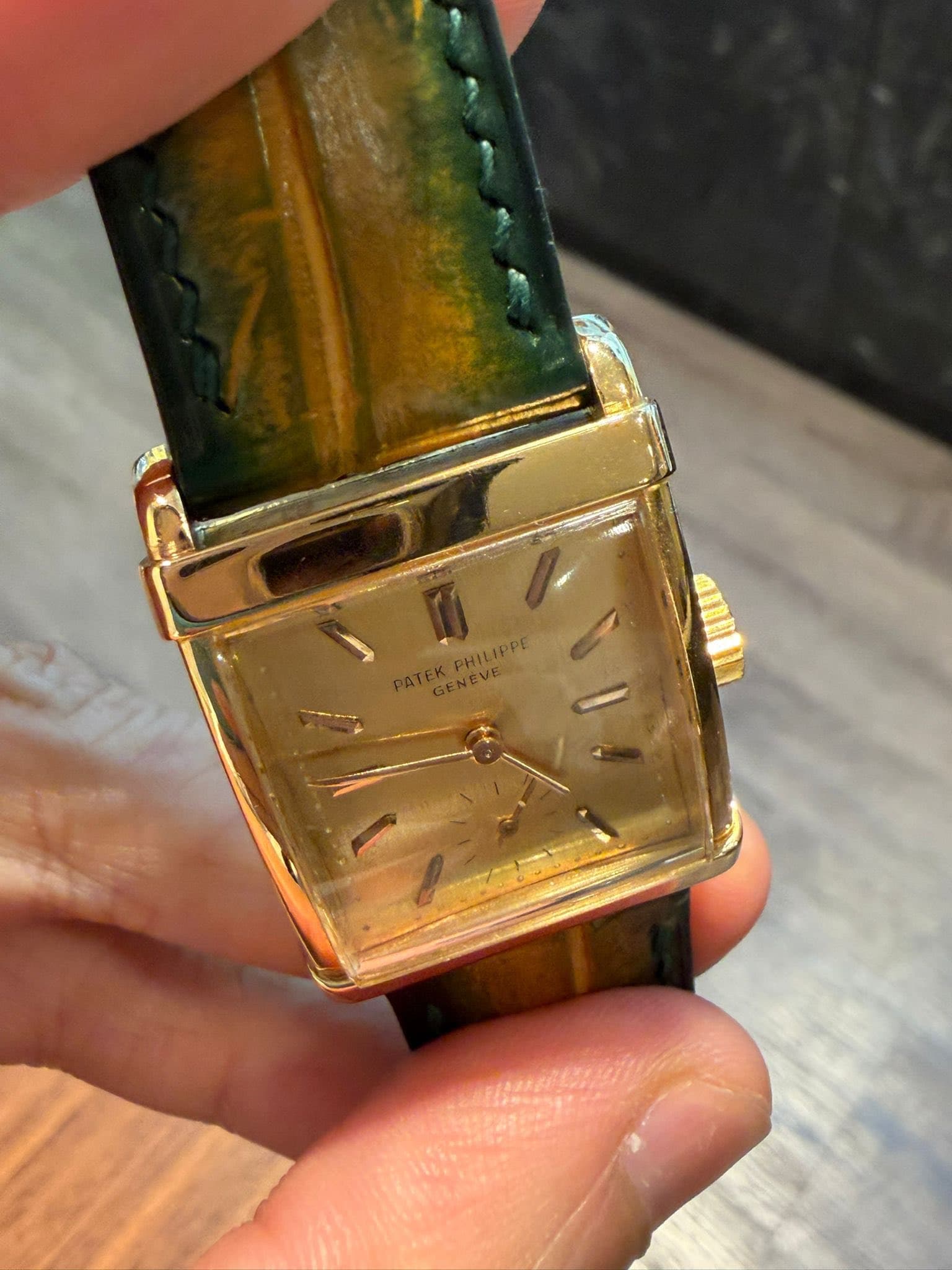 May be an image of wrist watch and text that says 'PATEK PATERENEVE PATE PATEKPHILIPPE GENEVE PHILIPPE'