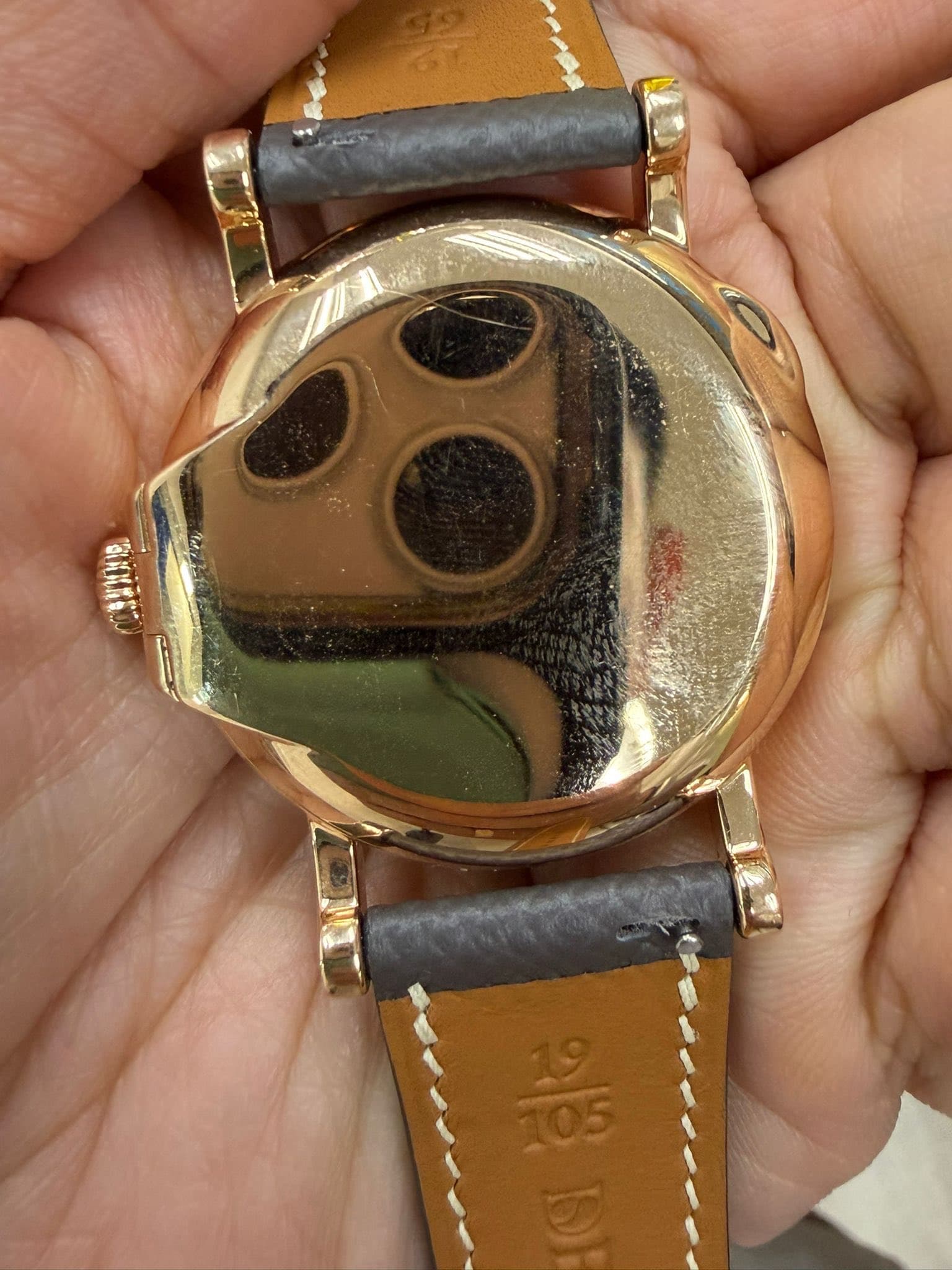 May be an image of digital watch and text