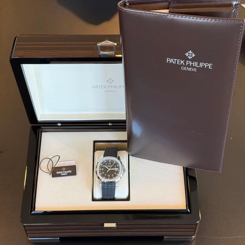 May be an image of wrist watch and text that says 'PATEK GENEVE PATEKPHILIPPE PHILIPPE PATEKPHILIP GENEVE PATEKPI PHILIP PAZEK INERR'