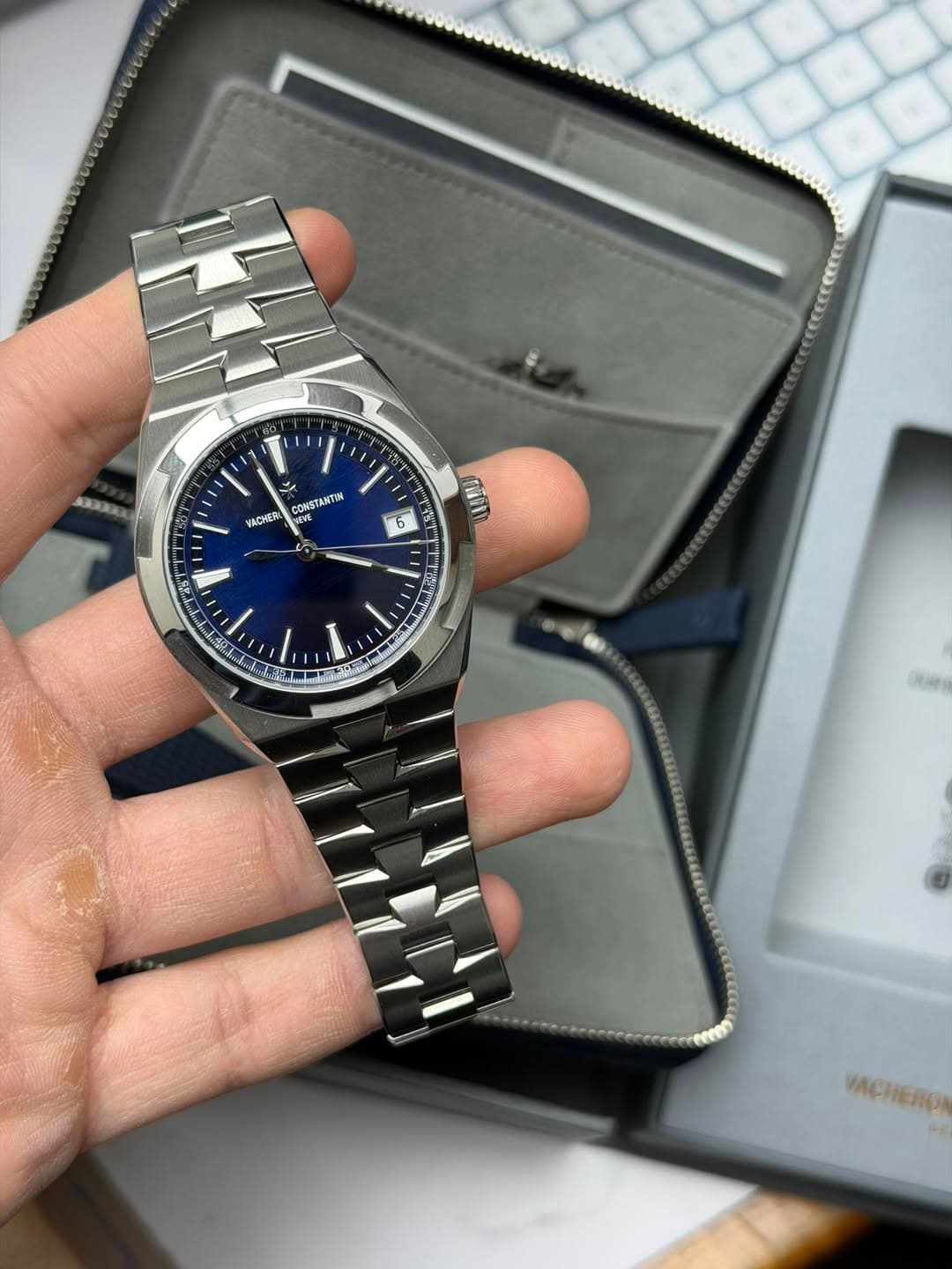 May be an image of wrist watch and text