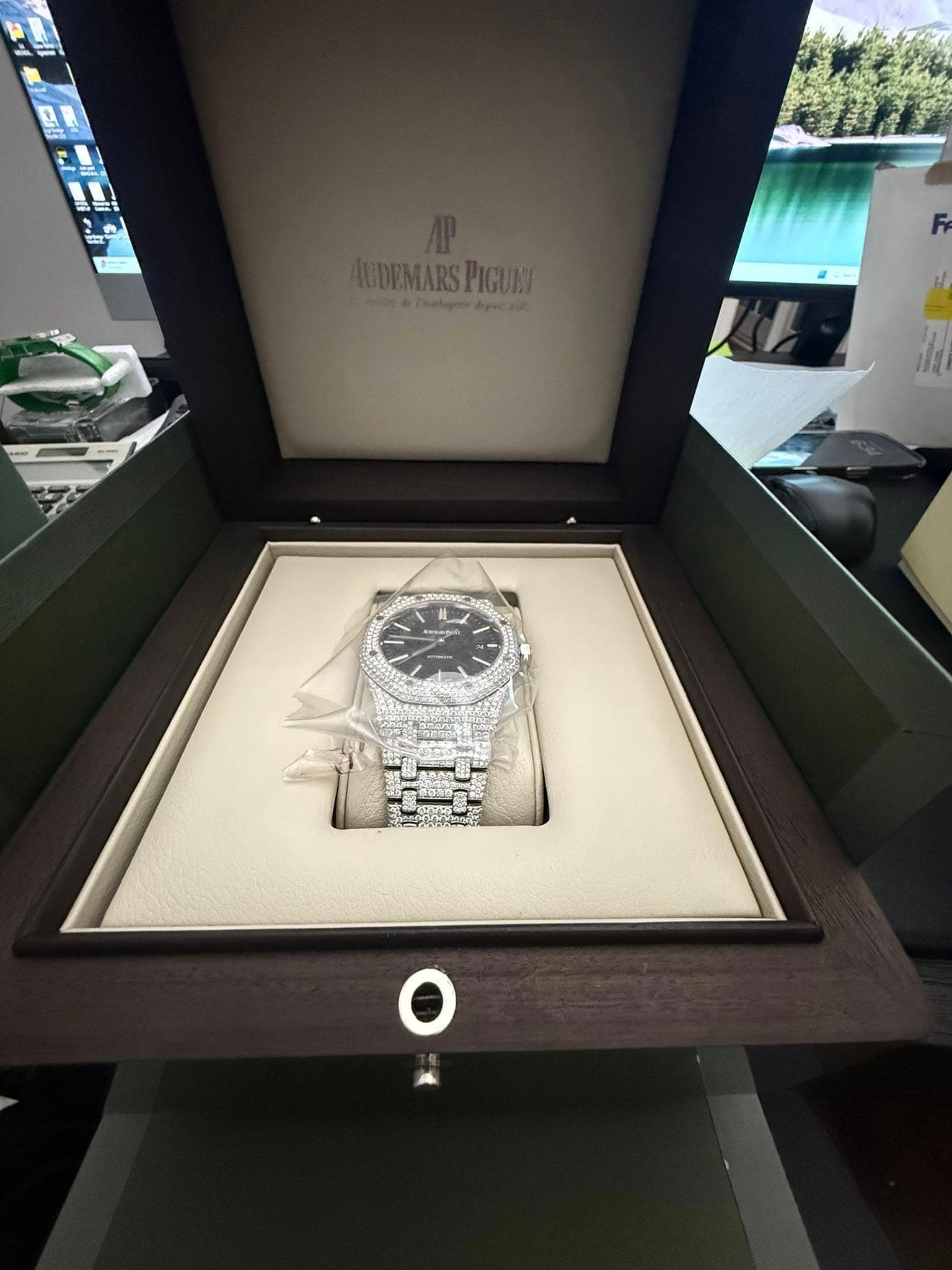 May be an image of wrist watch and text
