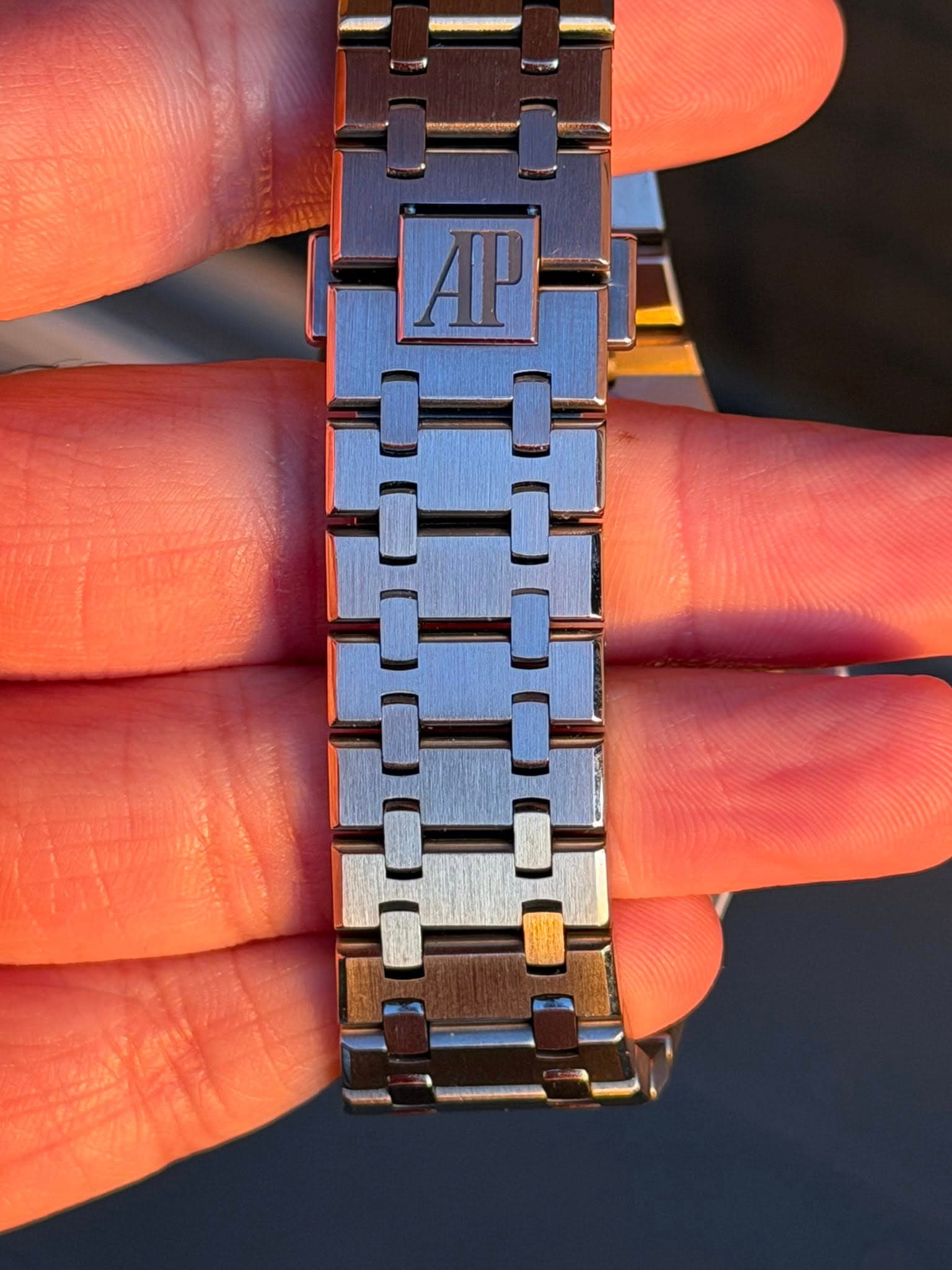 May be an image of wrist watch
