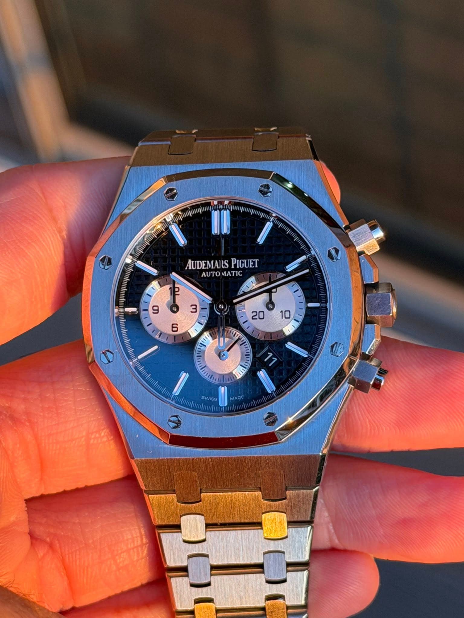 May be an image of wrist watch and text