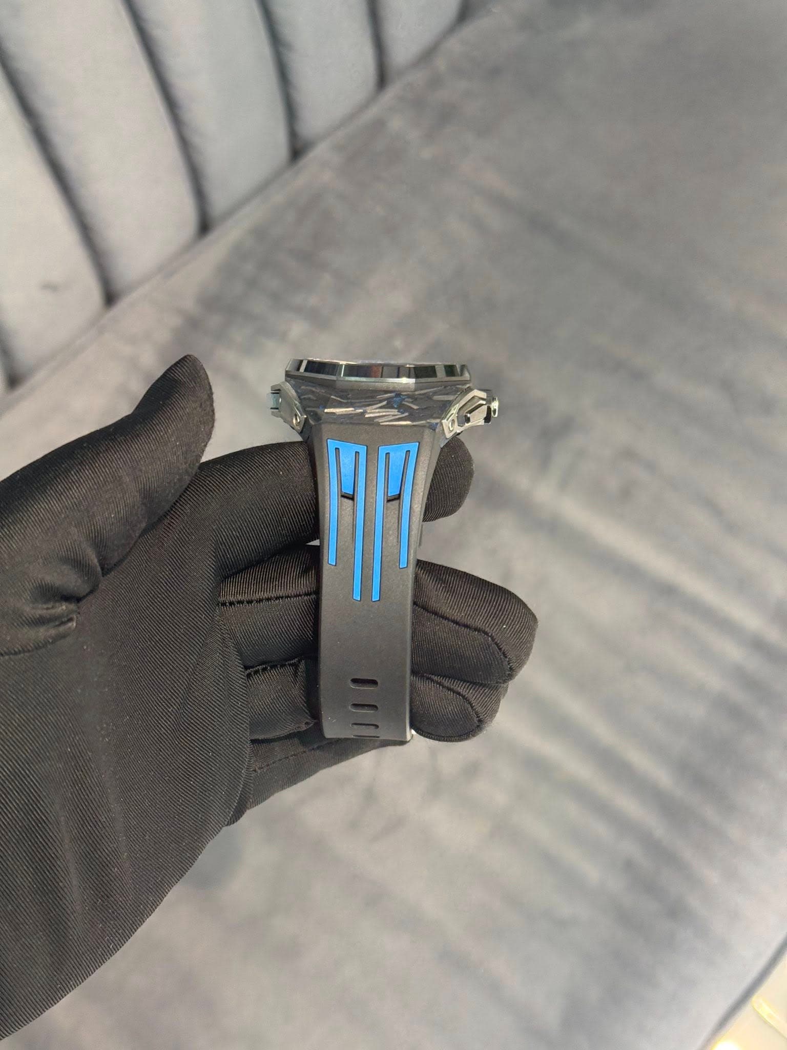 May be an image of wrist watch and knife