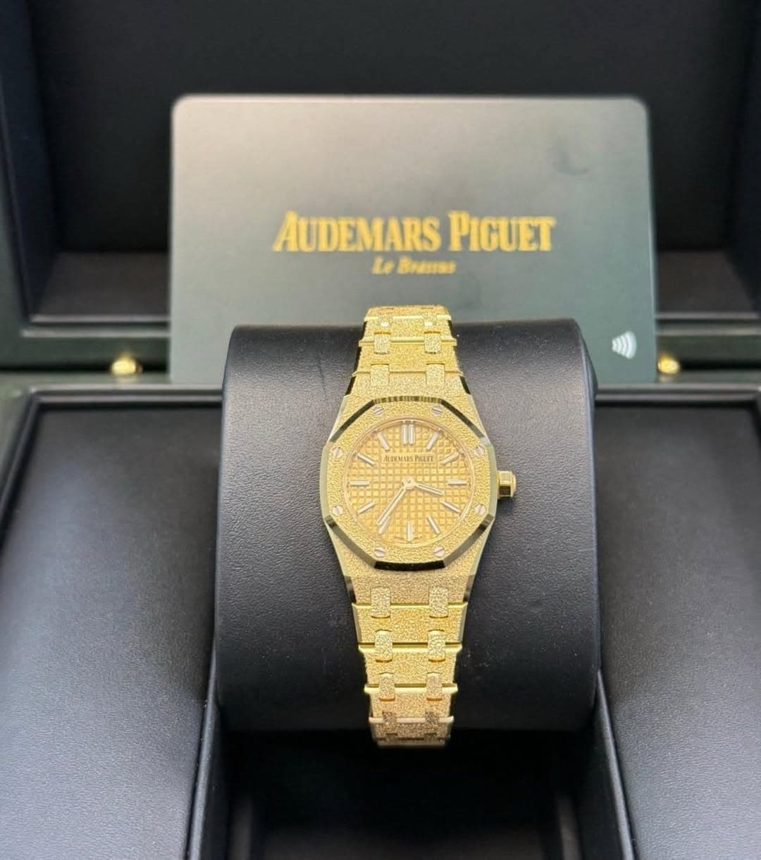 May be an image of wrist watch and text