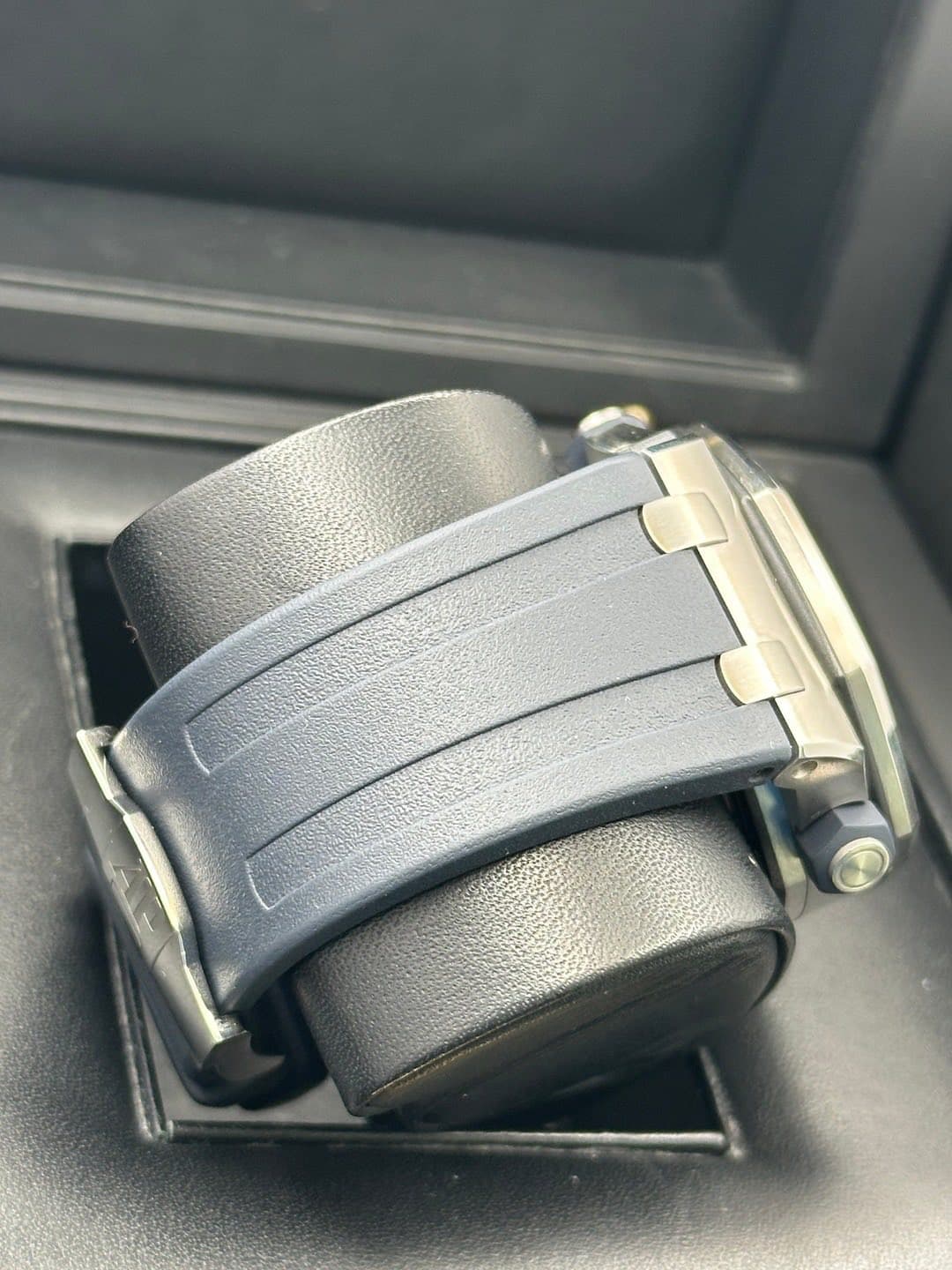 May be an image of saddle-stitched leather and wrist watch