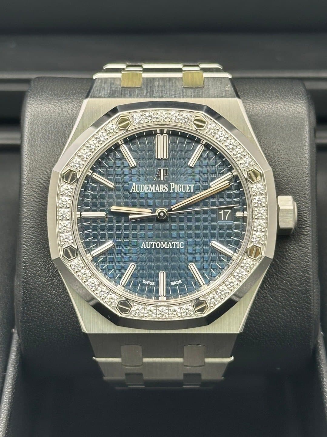 May be an image of wrist watch and text