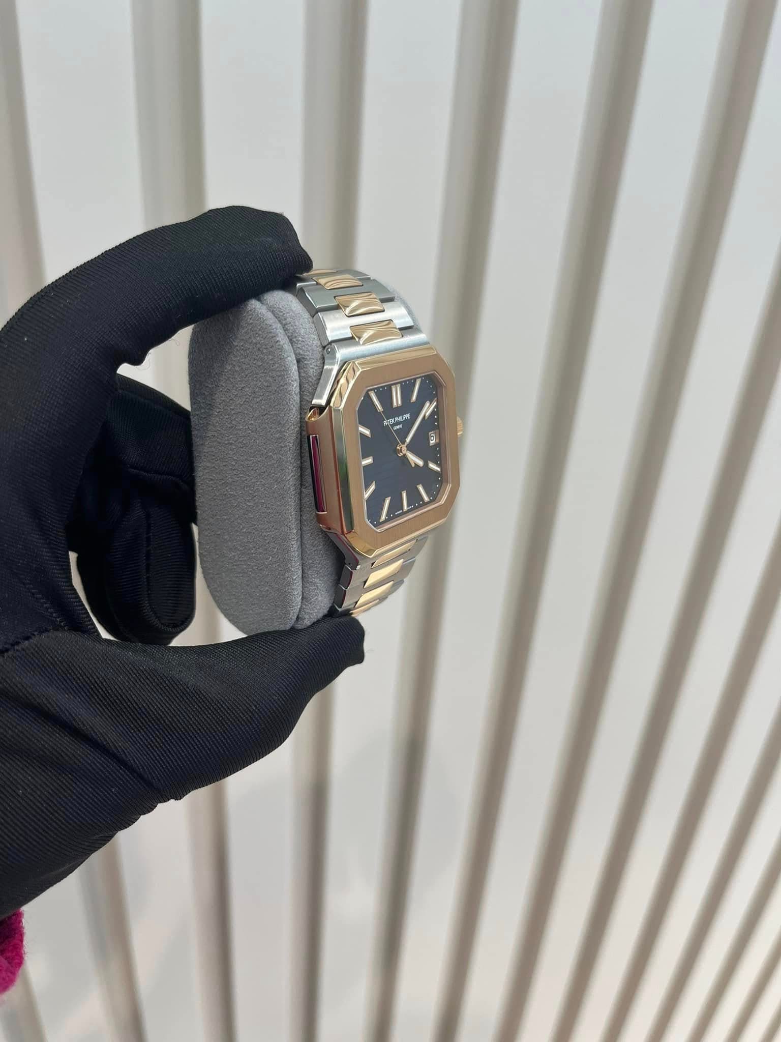 May be an image of wrist watch and text