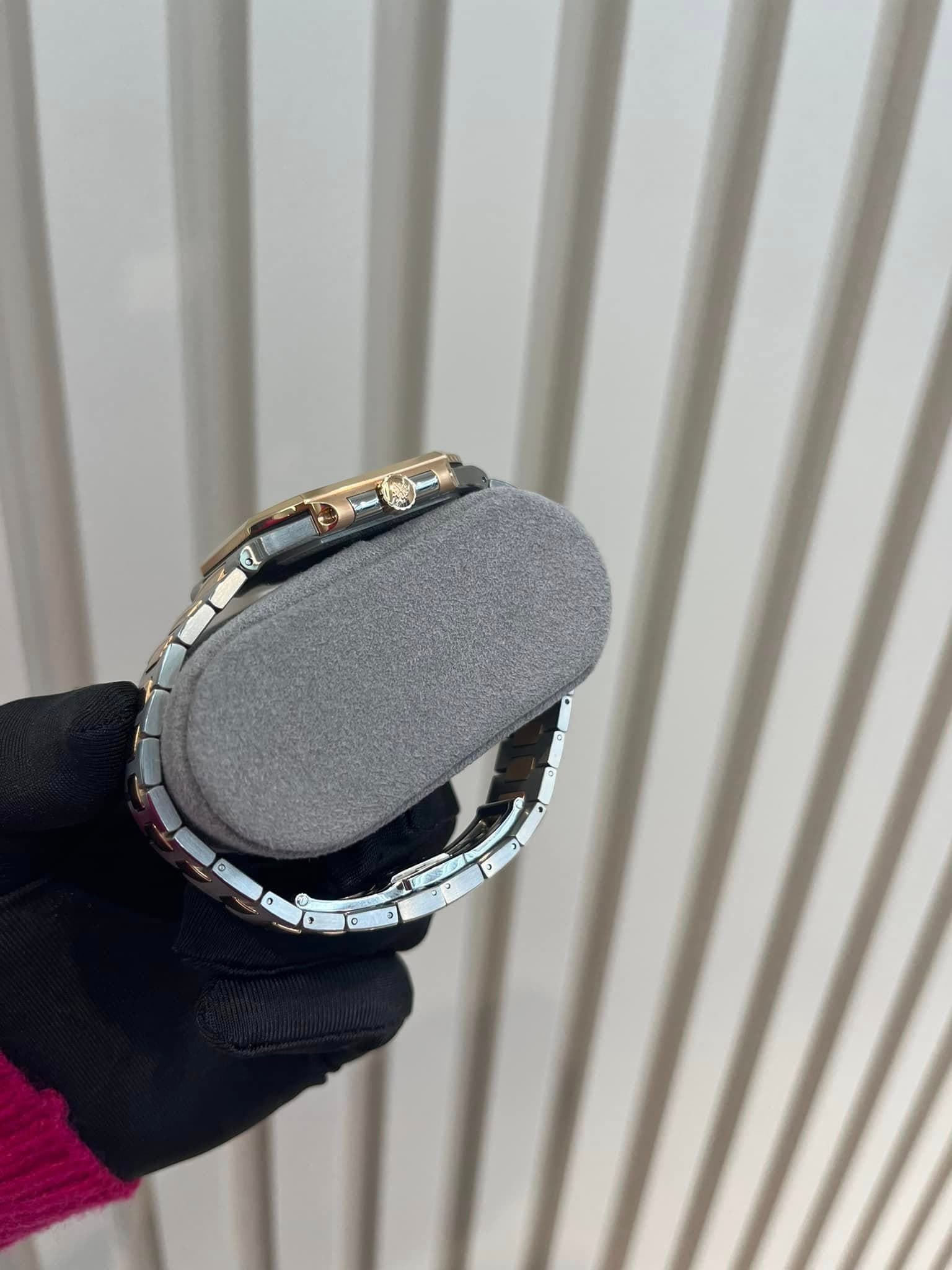 May be an image of digital watch and speaker