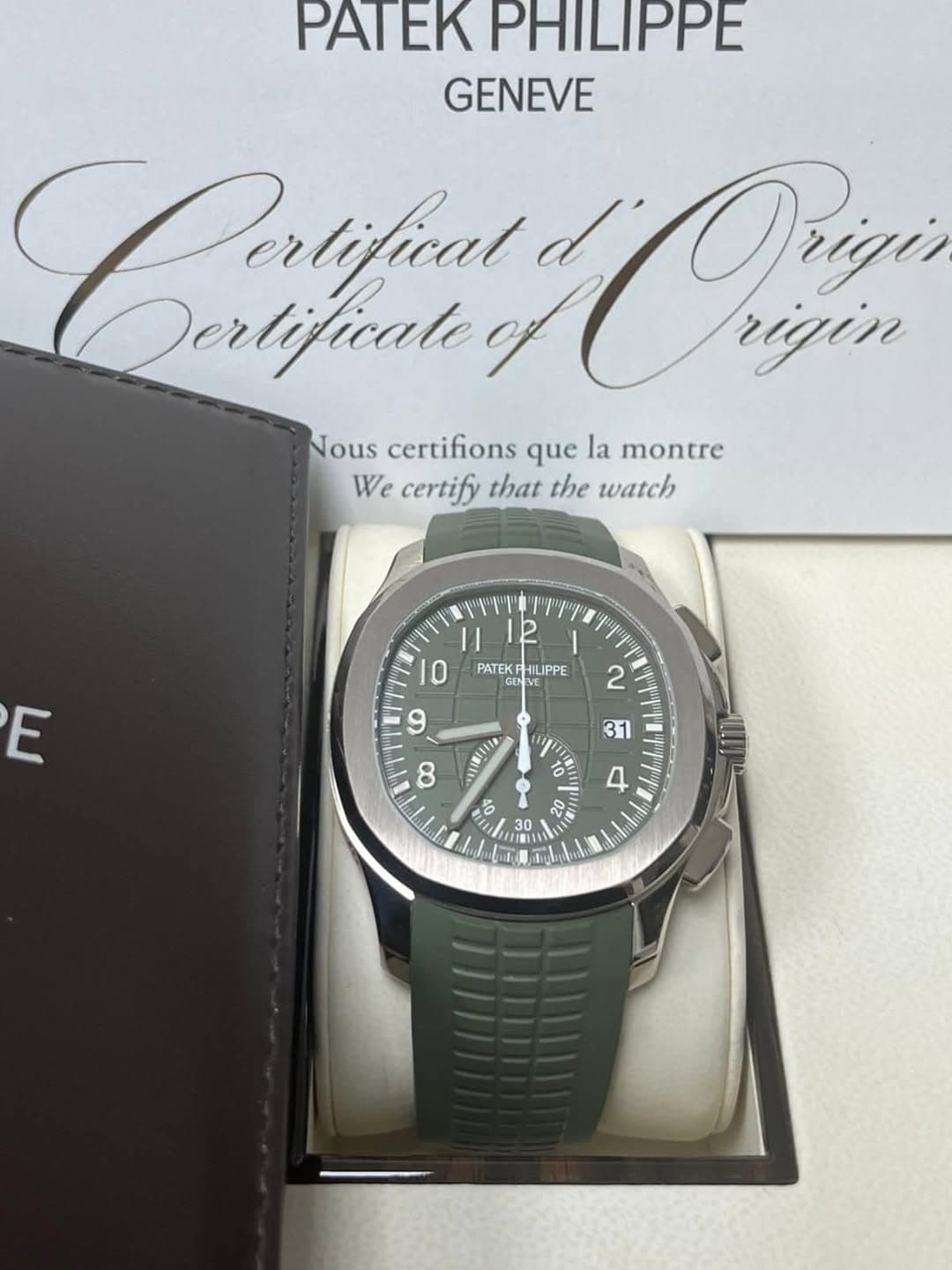 May be an image of wrist watch and text that says 'PATEK PHILIPPE GENEVE Pertifical Crin Prizi Dertificate rigin Nous certifions que la montre We certify that the watch PATEK…