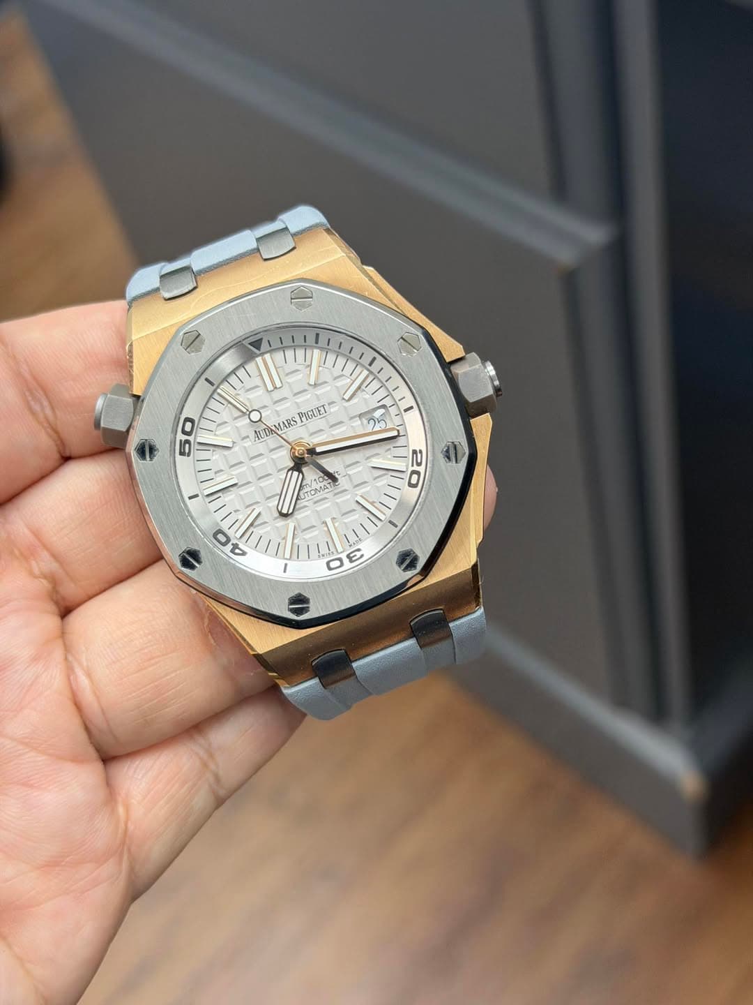 May be an image of wrist watch and text