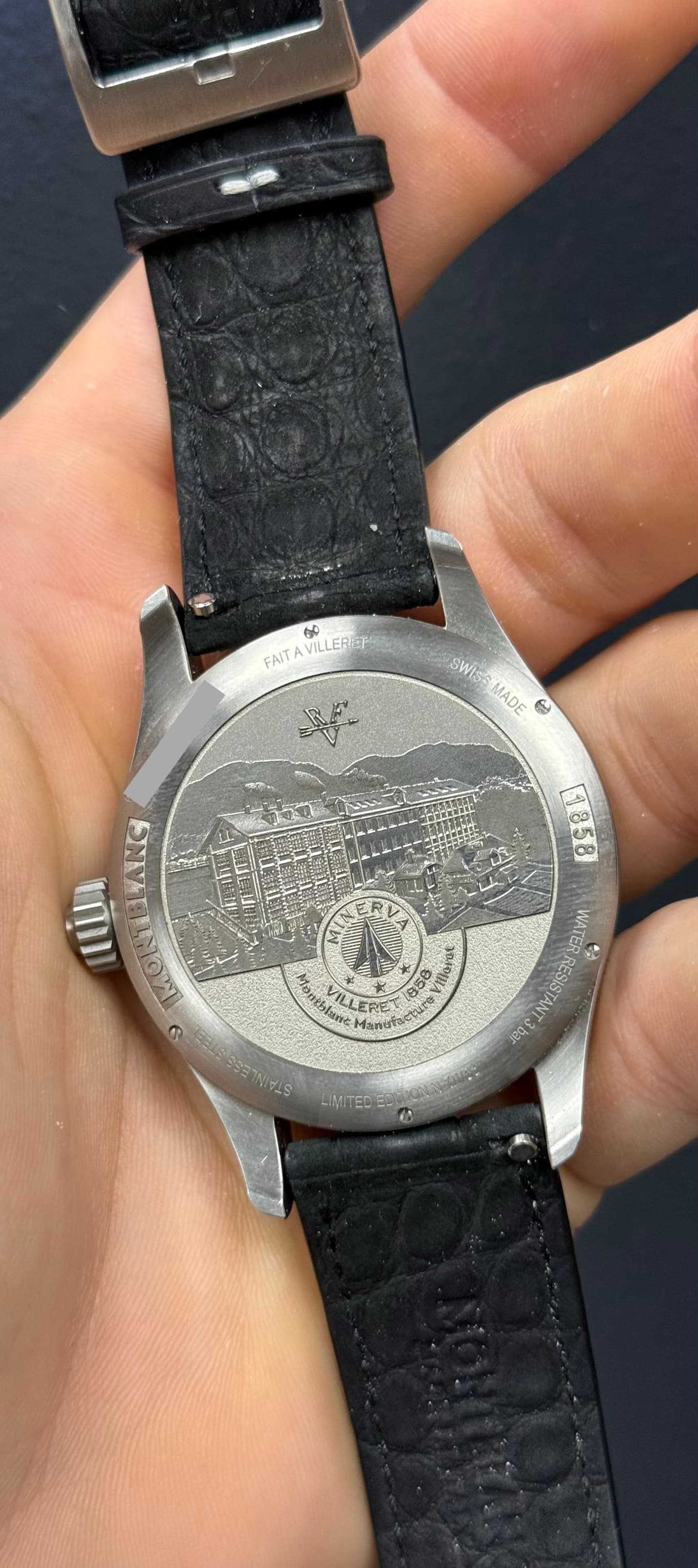 May be an image of wrist watch and text