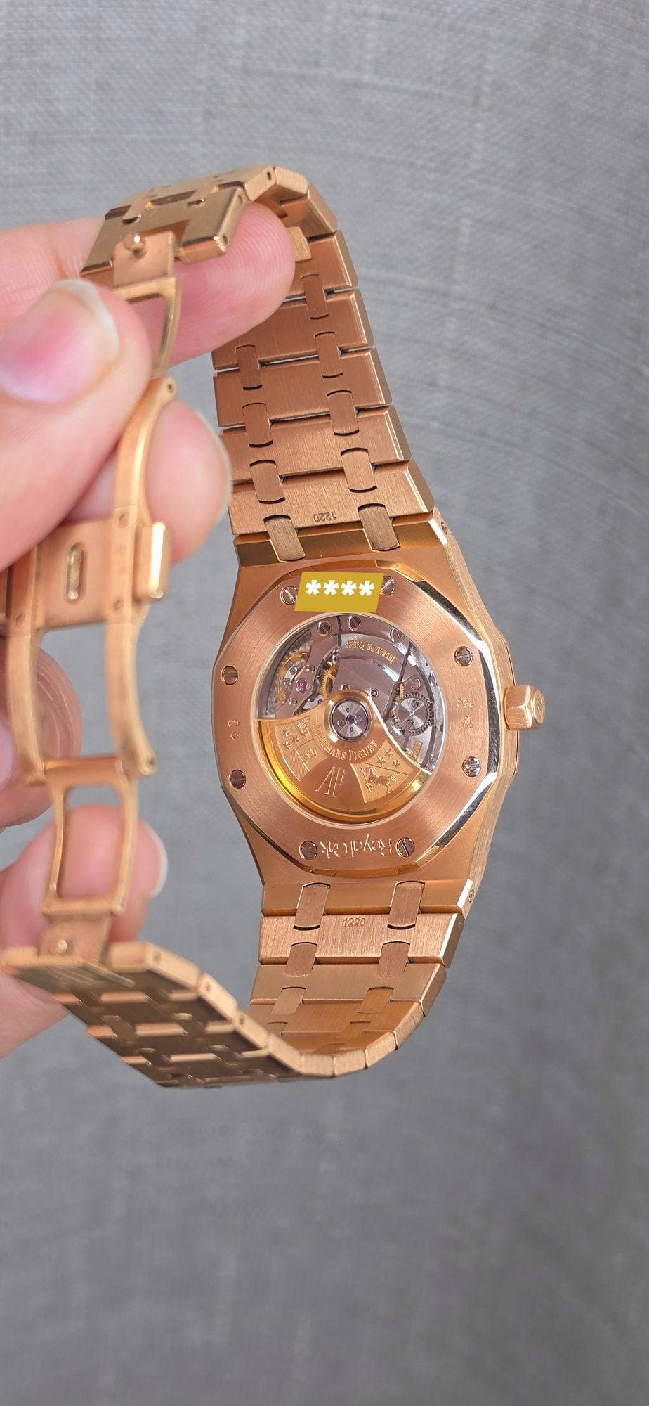 May be an image of wrist watch and text