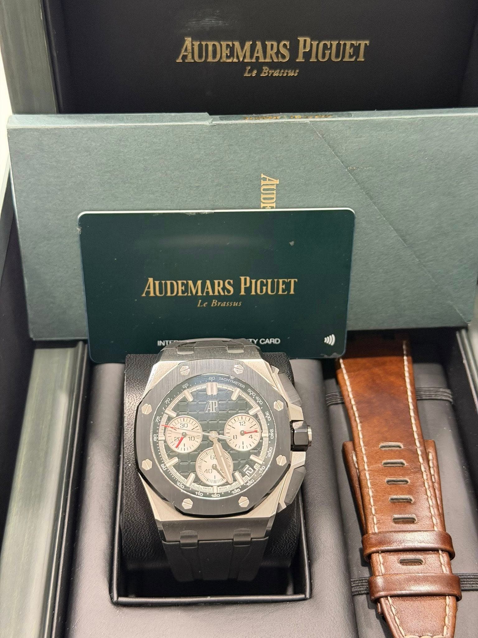 May be an image of wrist watch and text that says 'AUDEMARS AUDEMARSPIGUES PIGUET BTawиR CO Ιαρν AUDEMARSPIGUET AUDEMARS PIGUET LeBrassus INTE م CARD ) P WT ၁၃၀,၀၀၀ 3po Y 100 t…