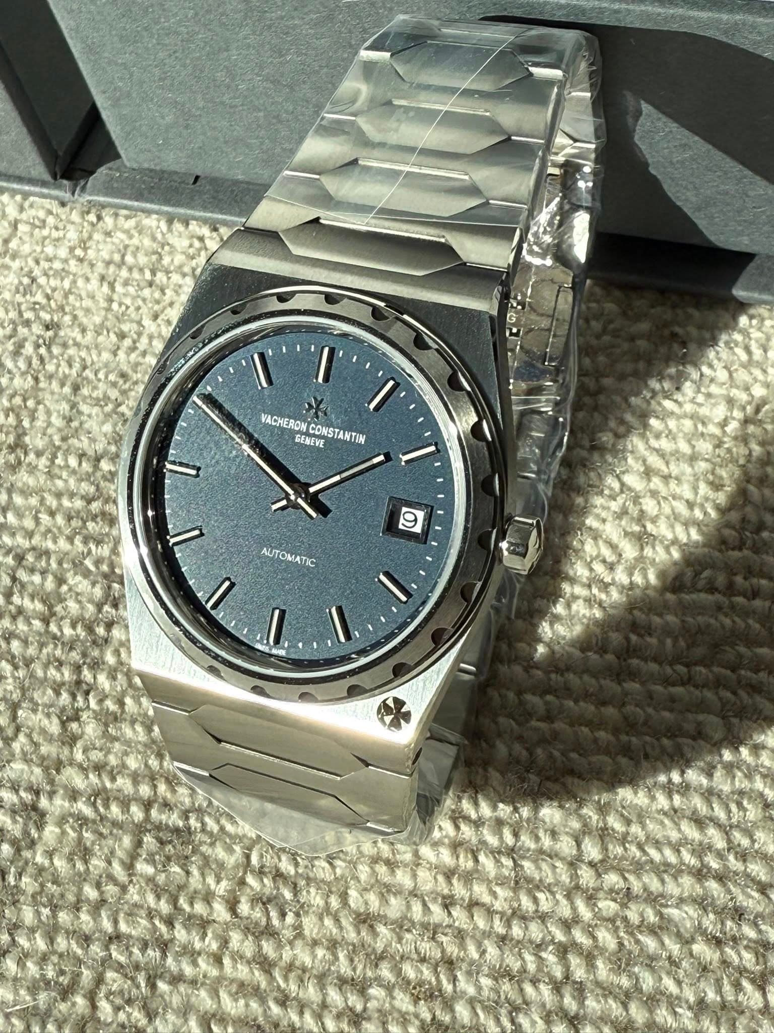 May be an image of wrist watch and text that says 'ق VACHERON GENEVE CONSTANTIN T 9 9 OMT !'