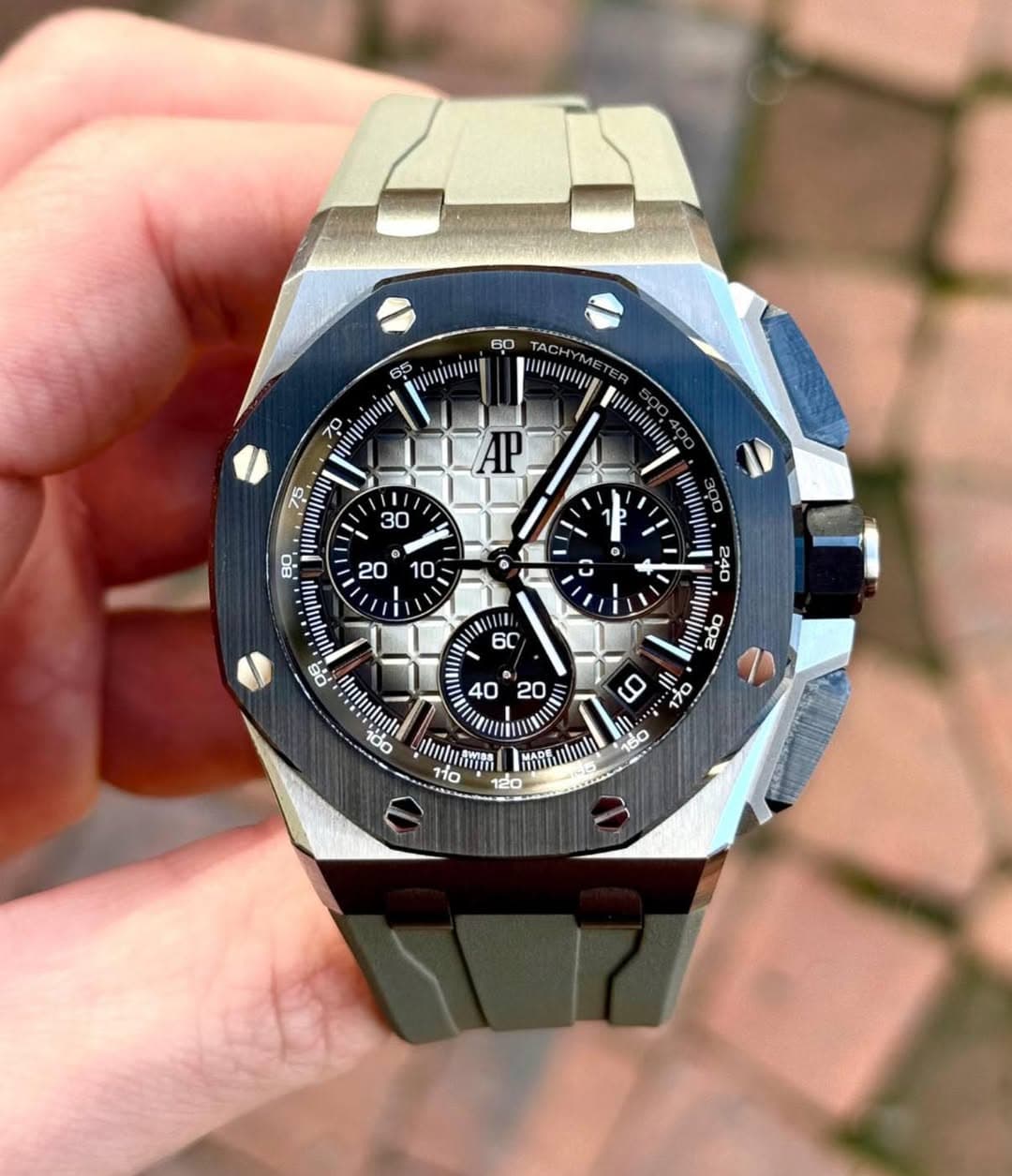 May be an image of wrist watch and text