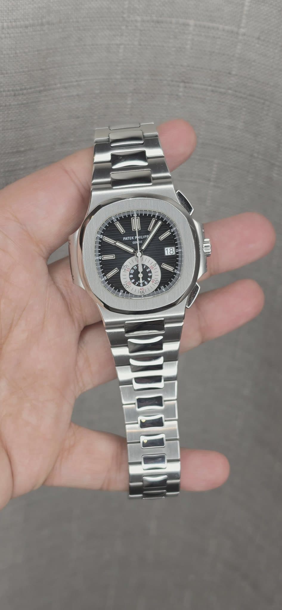 May be an image of wrist watch and text