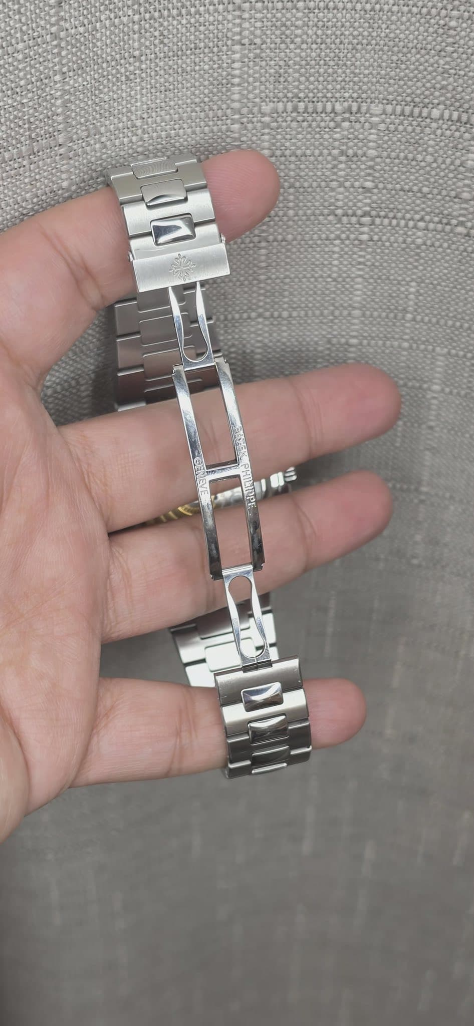May be an image of wrist watch and jewelry
