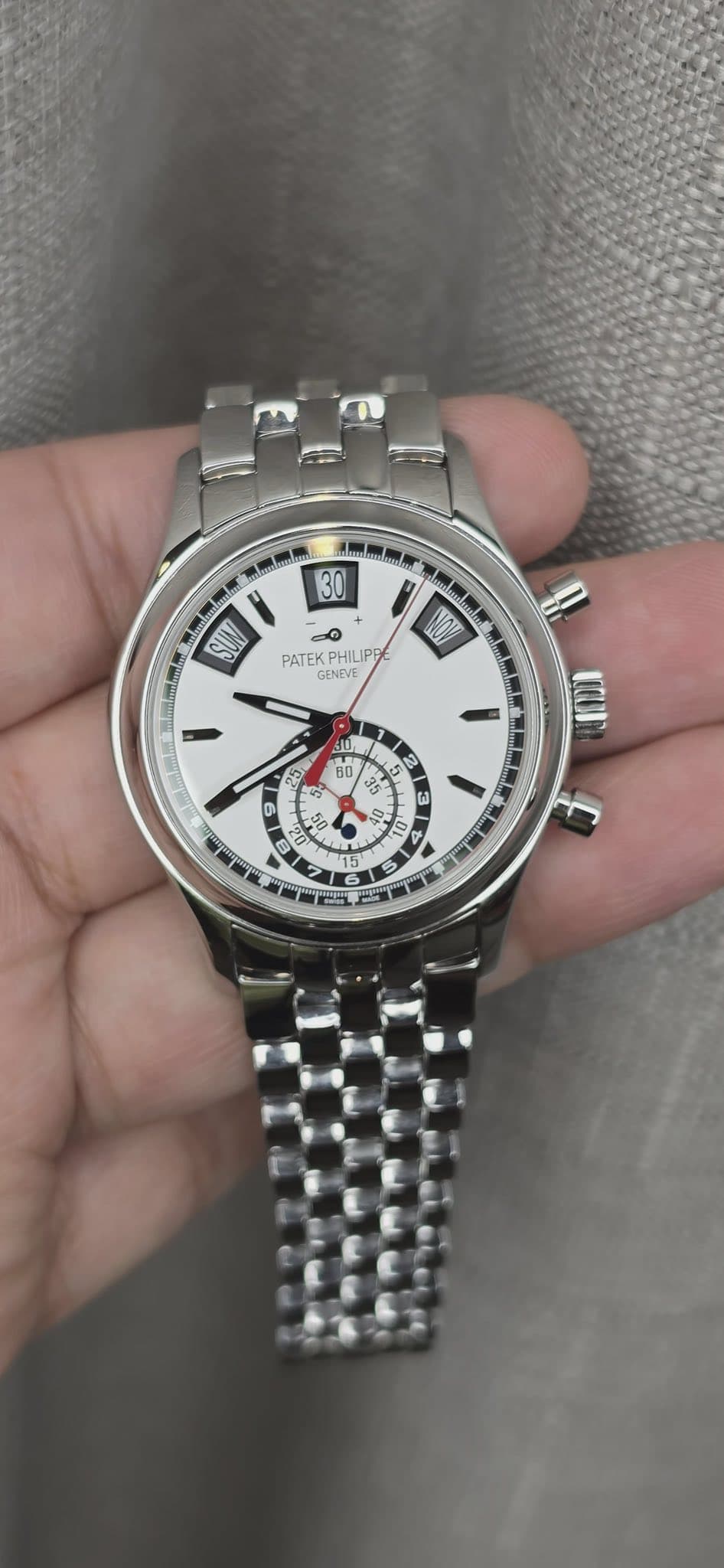 May be an image of wrist watch and text that says '30 SUN PATEK PHILIPE GENVE NOV UaI 40 50 a 5o 2 ي 42 5 7e ه ا 3 藍 3 6 X S 10 हਖ 1 DI G 2 5 15% C 0'