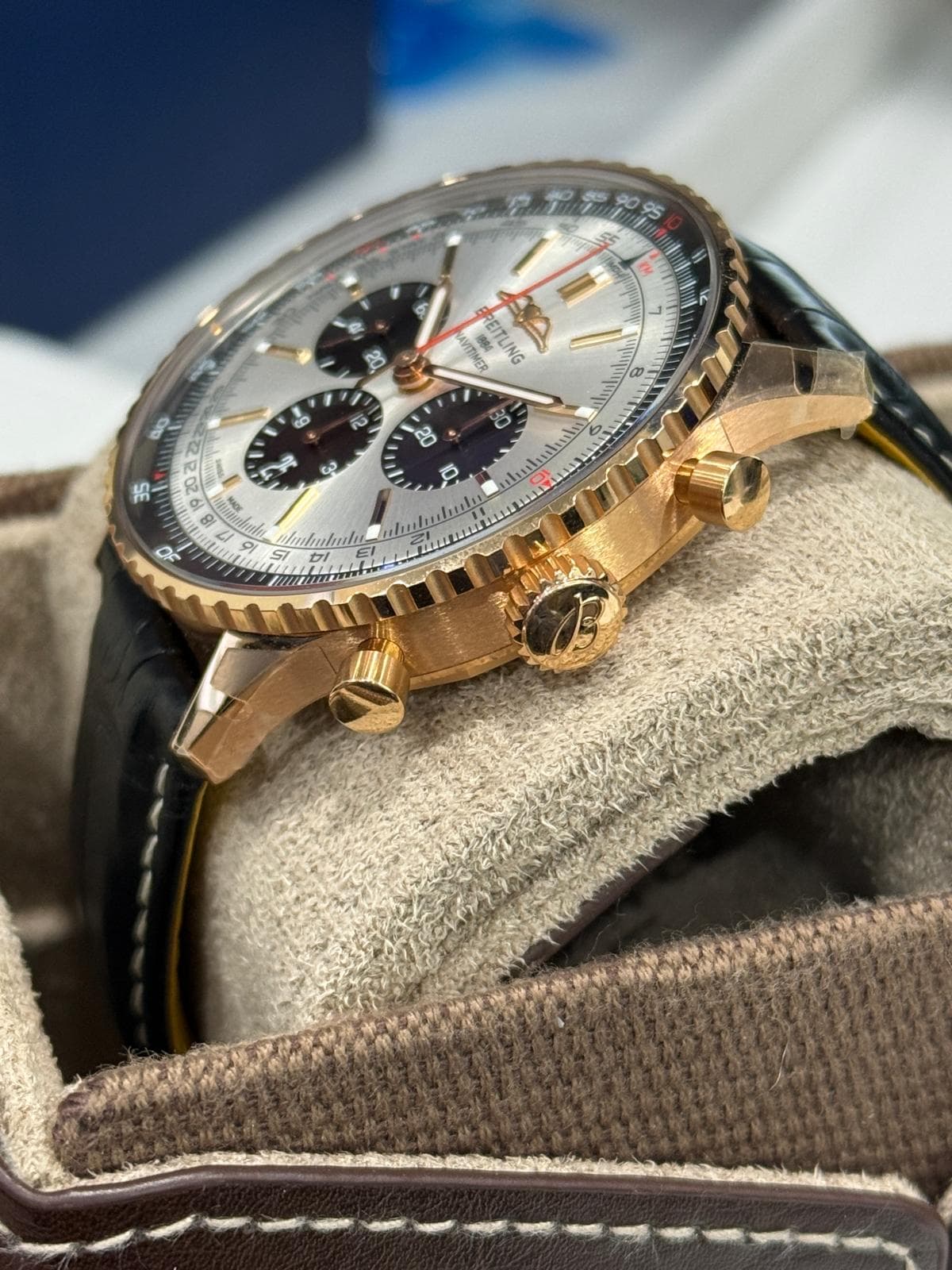 May be an image of wrist watch and text