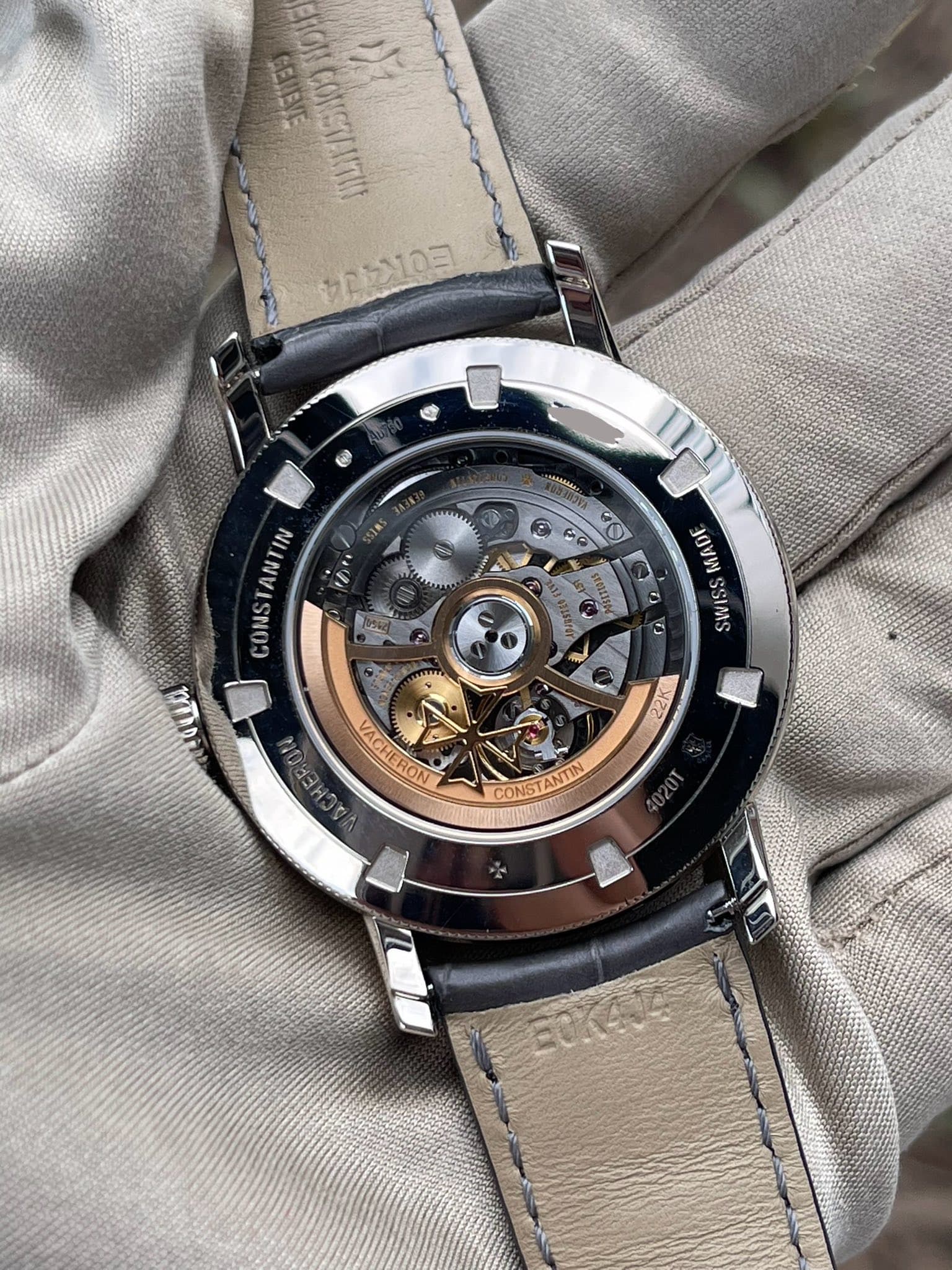May be an image of wrist watch and text