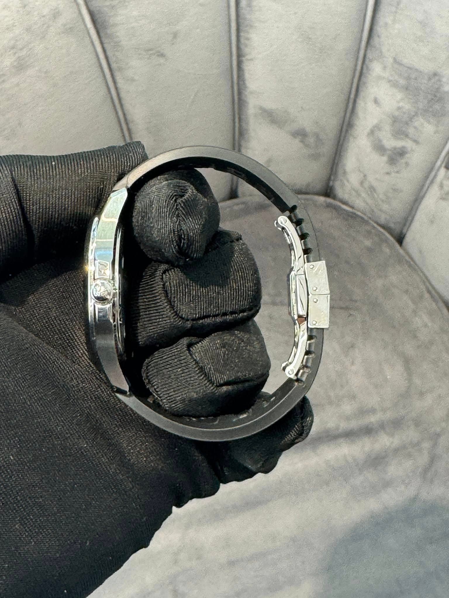 May be an image of wrist watch
