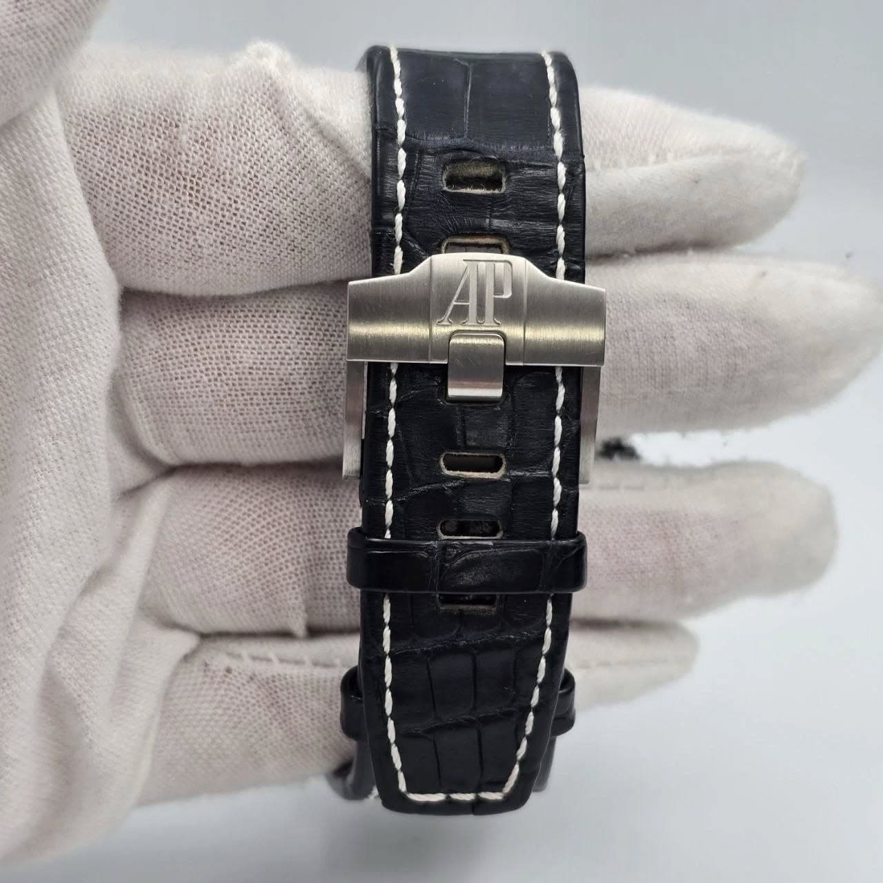 May be an image of leather and wrist watch