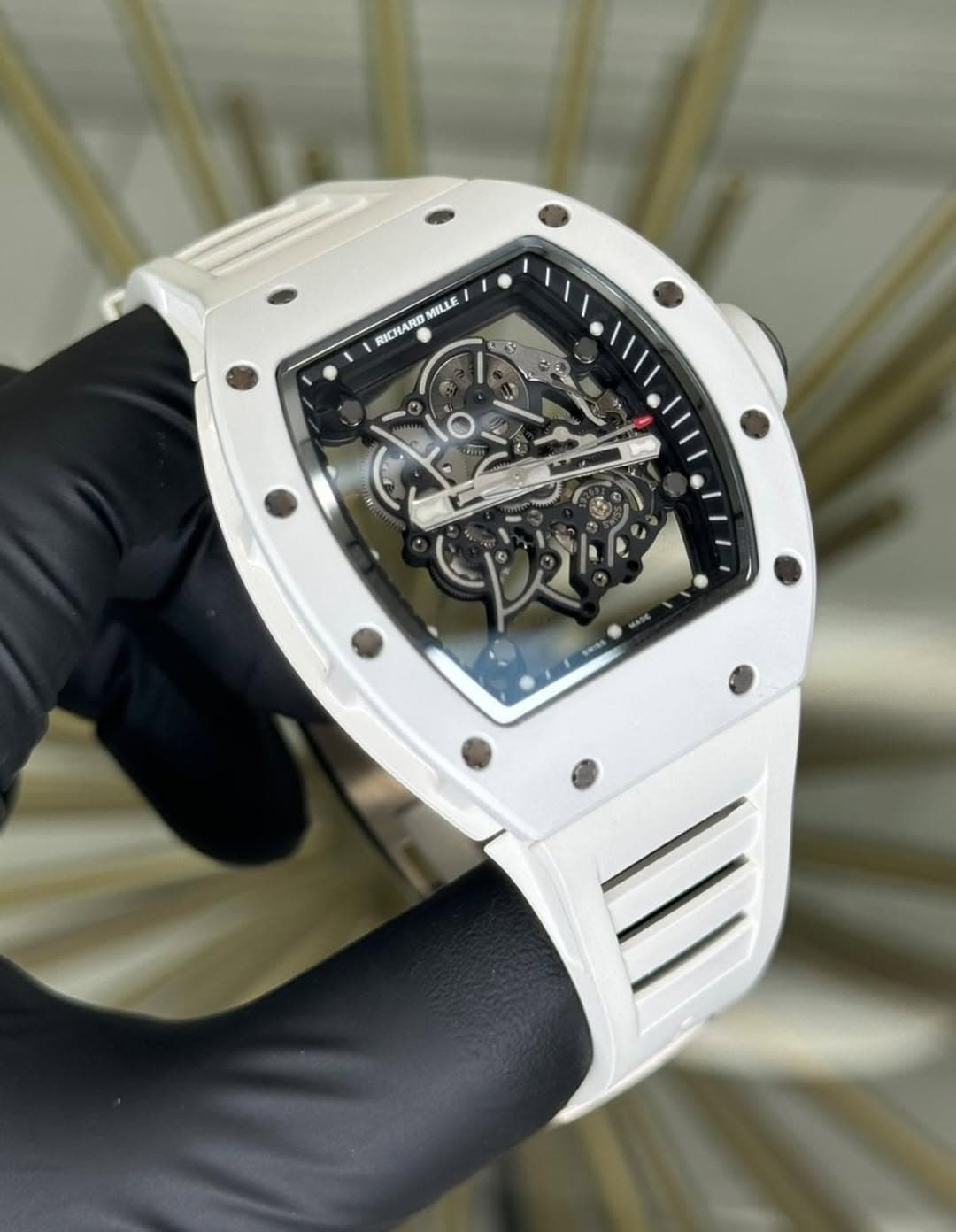 May be an image of wrist watch and text that says 'MUILLE RICHARD'