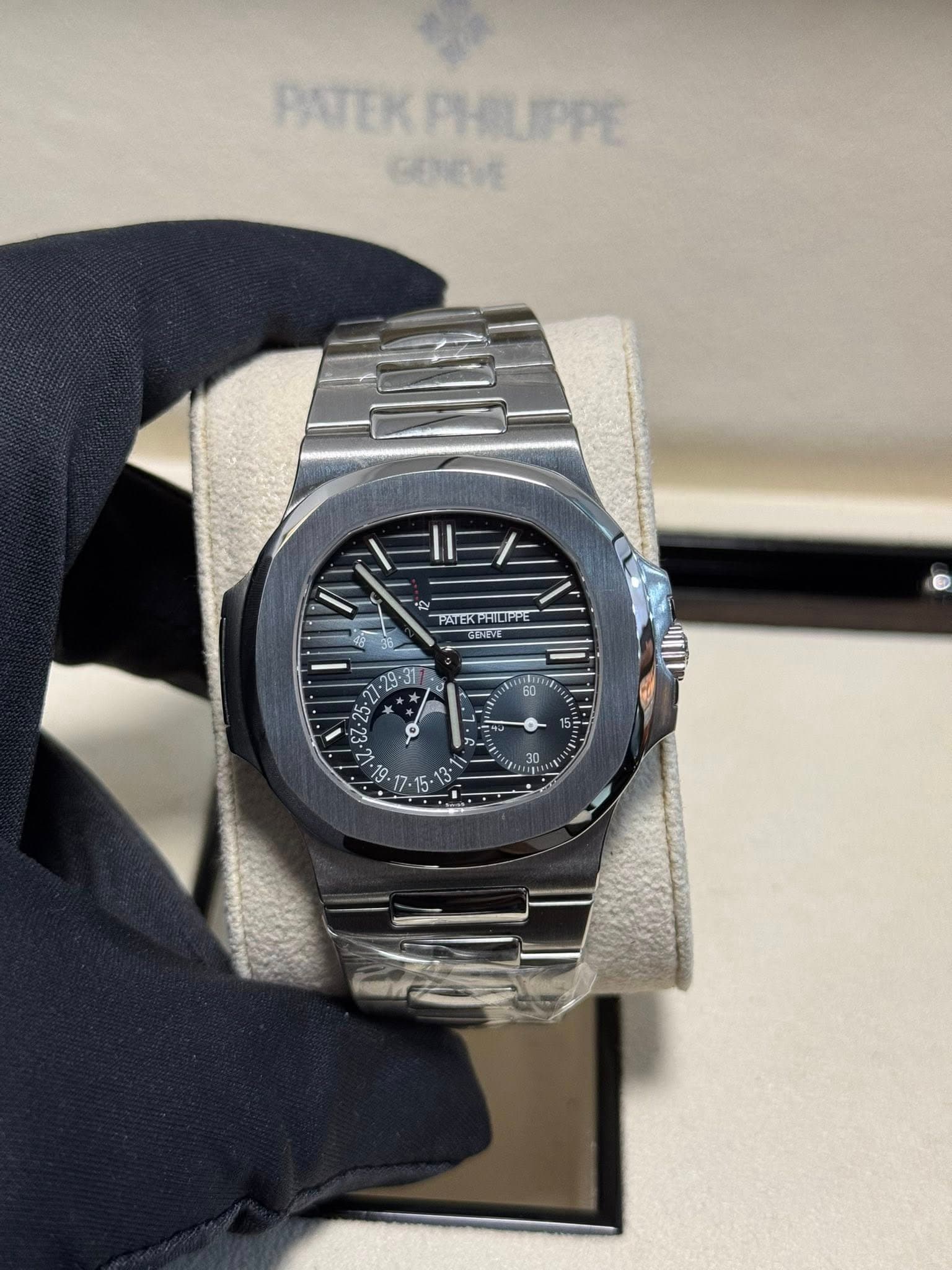 May be an image of wrist watch and text