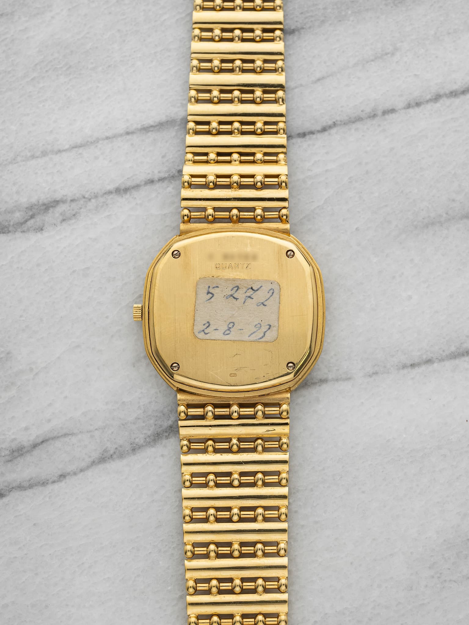May be an image of digital watch and text